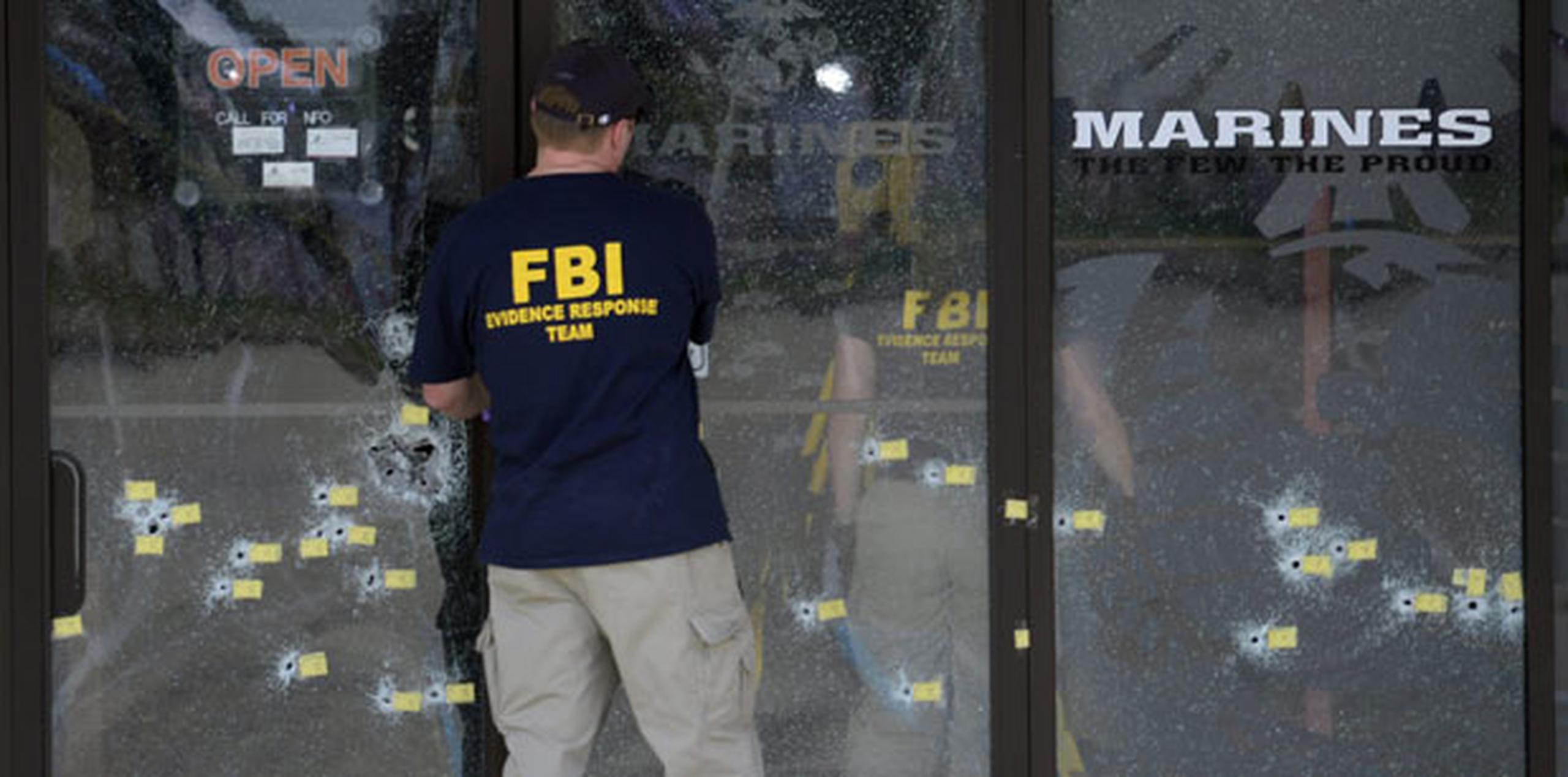 Las autoridades investigan el ataque a tiros como un acto de terrorismo. (EFE/EPA/Billy Weeks)
