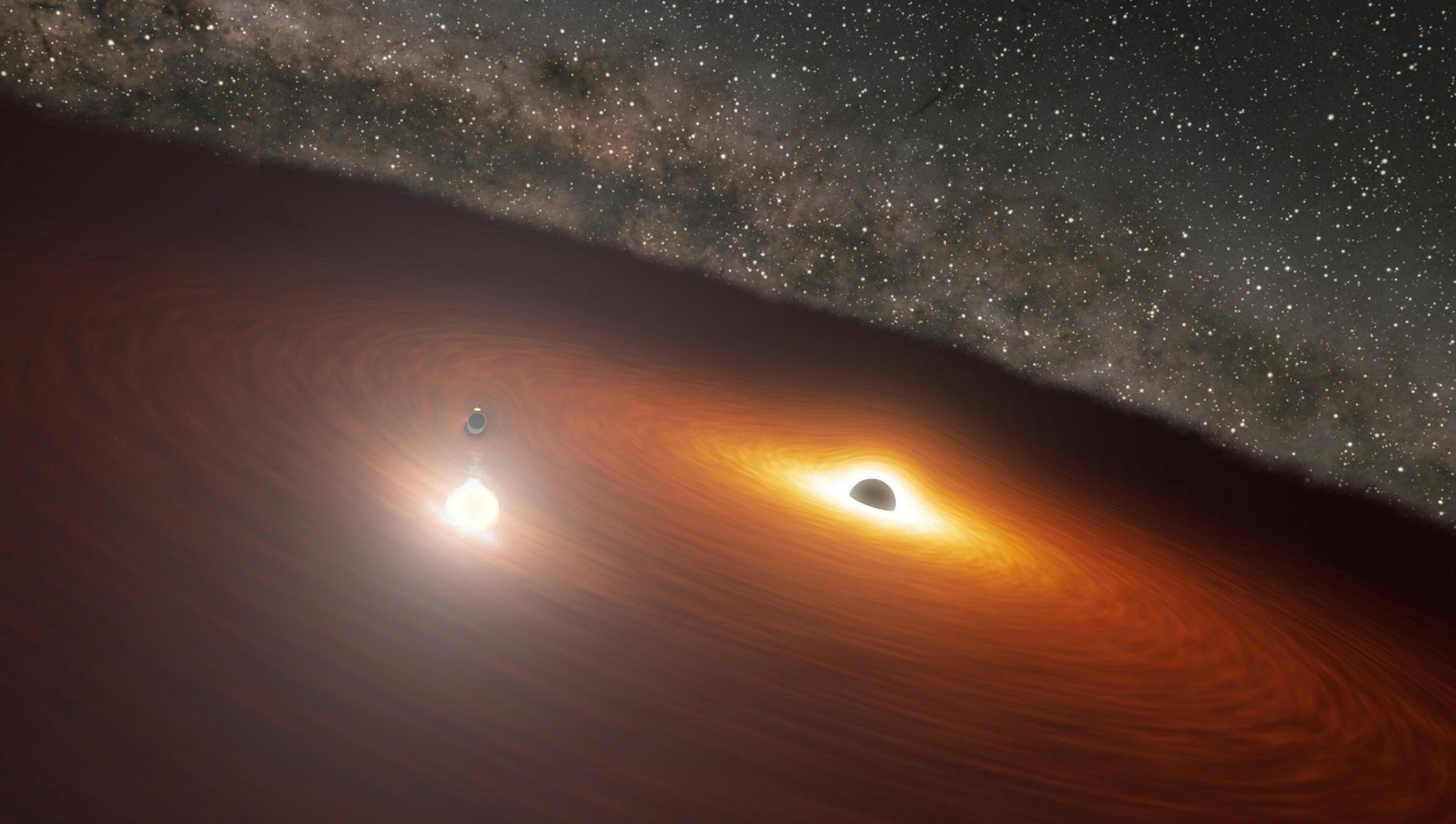 La comparación de las observaciones espaciales y terrestres ha revelado que la galaxia OJ 287, que pertenece al grupo de los “blázares” -las fuentes de radiación continua más potentes del universo-, no alberga uno, sino dos agujeros negros “supermasivos”.