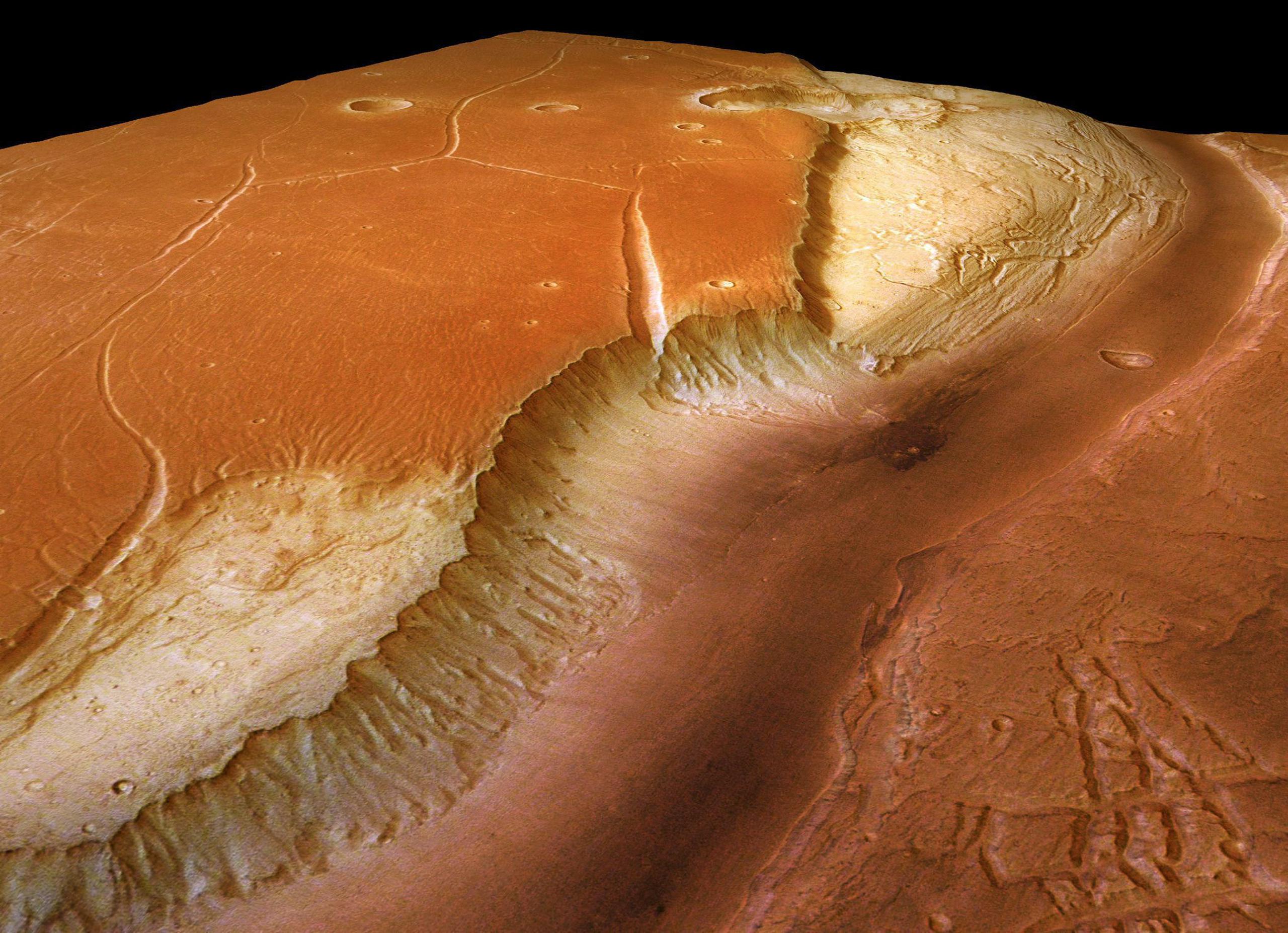 Fotografía del 1 de enero 2006 tomada por la nave espacial 'Mars Express' que muestra un gigantesco valle glacial en el planeta Marte. Es llamado 'Kasei Valles', tiene 2500 km de longitud y 500 km de ancho.