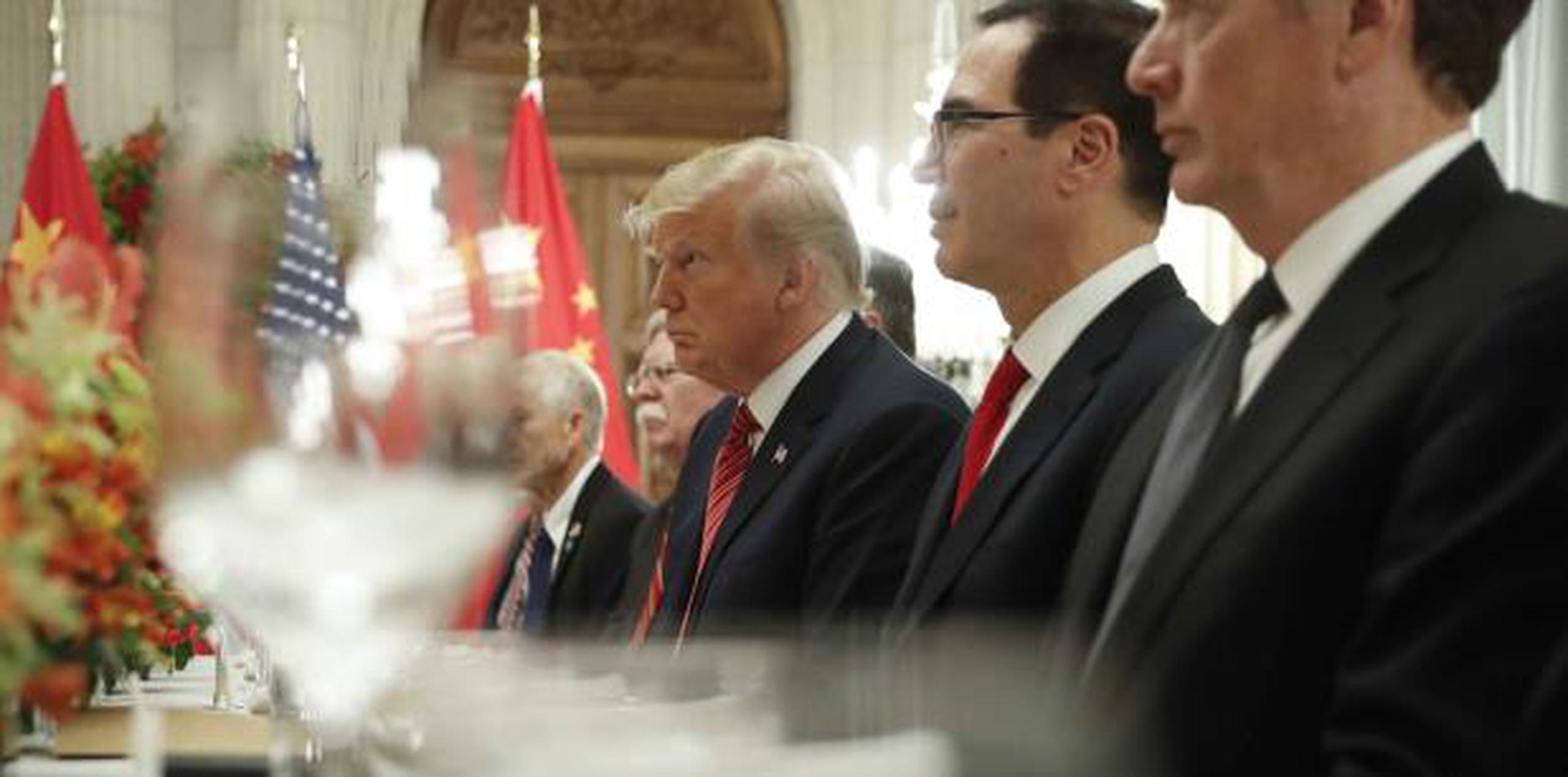 Trump en su cena con el presidente de China. (AP)