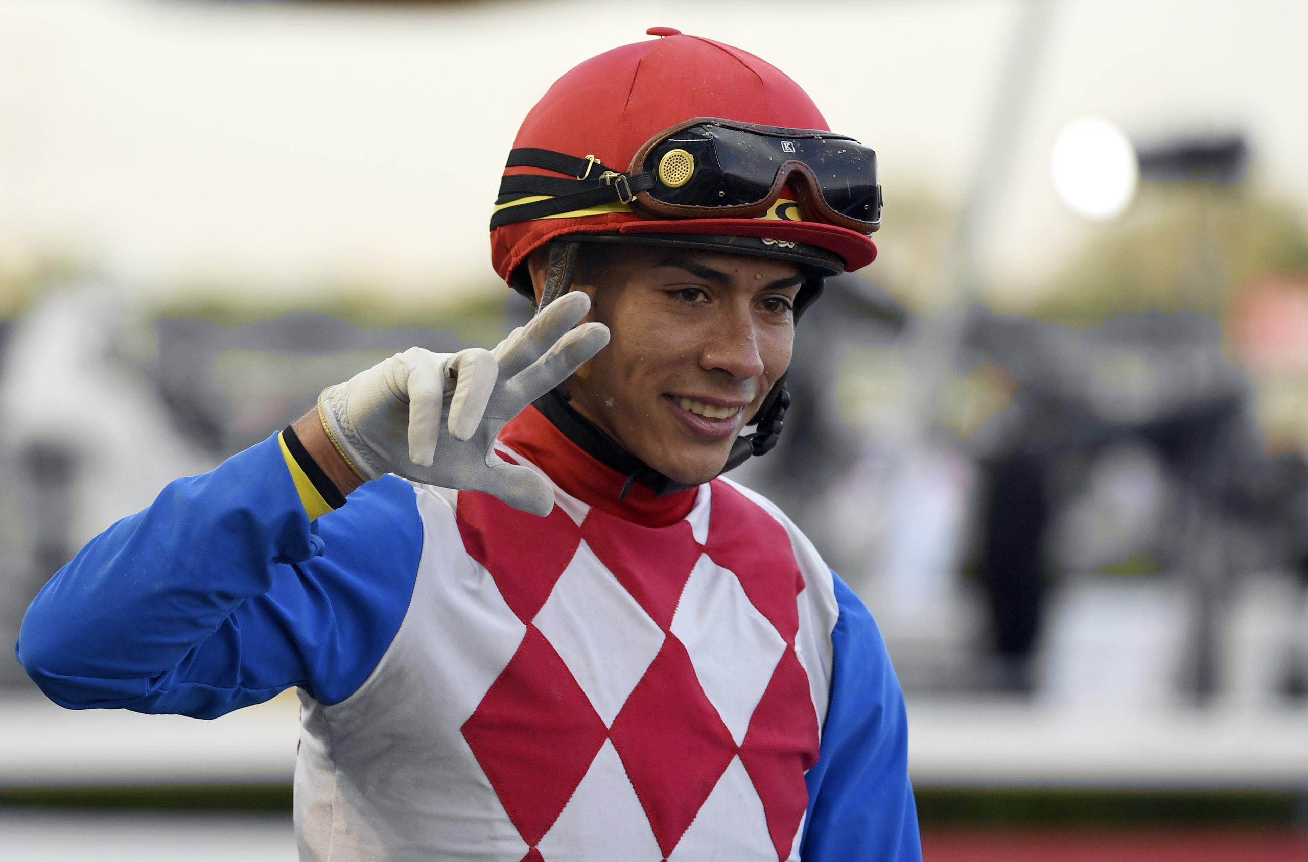 Jockey Jose Ortiz reacts after winning with Plus Que Parfait the $2.5 million Group 2 UAE Derby over 1900m in Dubai, United Arab Emirates, Saturday, March 30, 2019. (AP Photo/Martin Dokoupil)