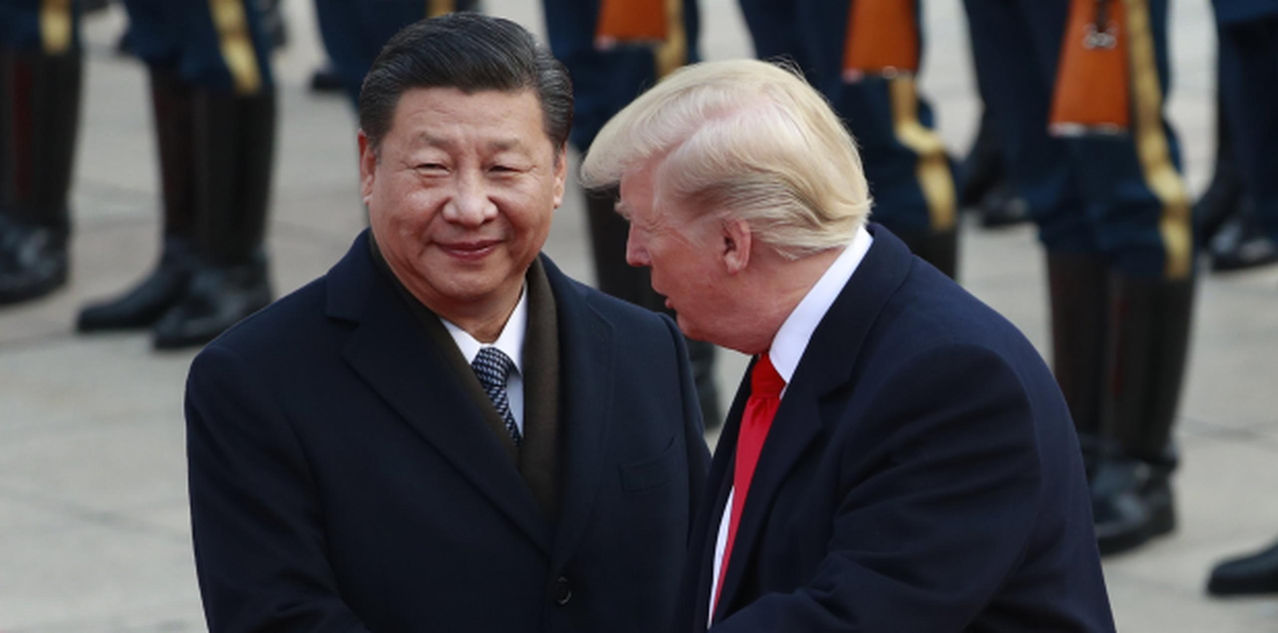 Trump visitó Pekín poco después de que los universitarios fueran detenidos y habló del tema con el mandatario chino Xi Jinping (Archivo)