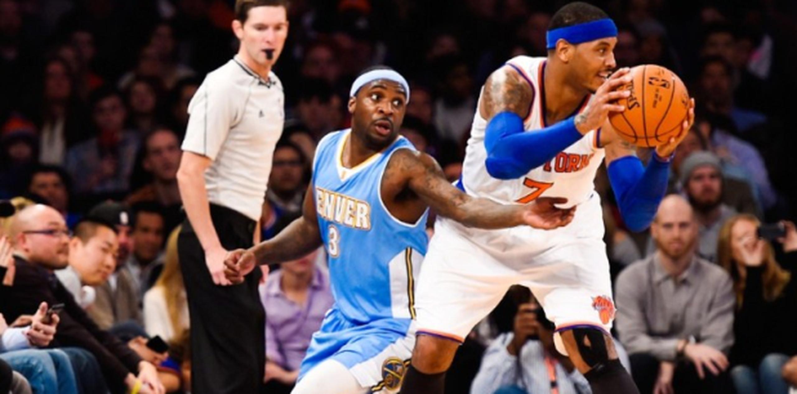 Un tiro de campo de Carmelo Anthony colocó la pizarra 79-54 a favor de los Knicks. (Alex Goodlett/Getty Images/AFP)