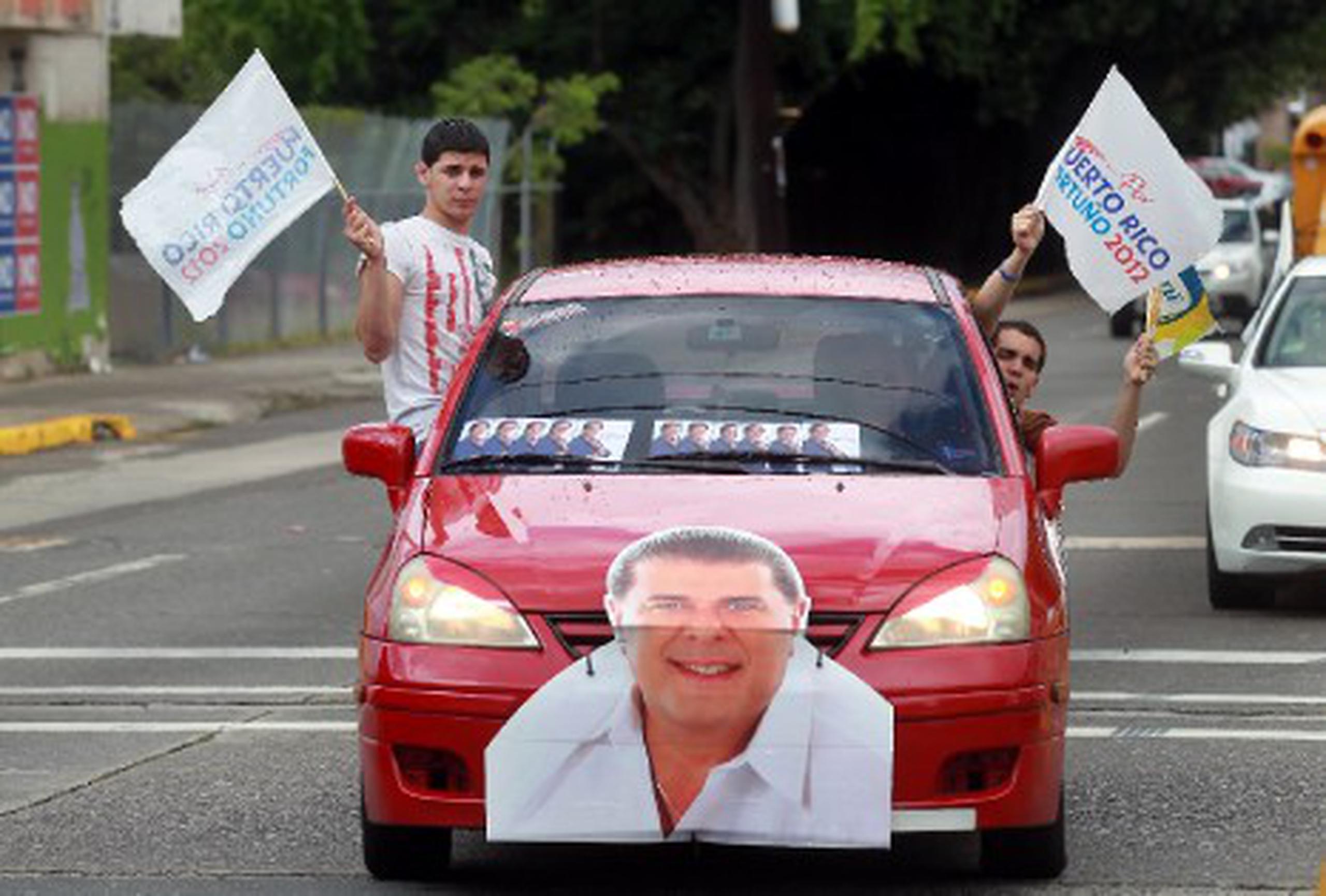 Ya algunos seguidores del alcalde Jorge Santini están llegando al comité de campaña en Hato Rey. (vanessa.serra@gfrmedia.com)
