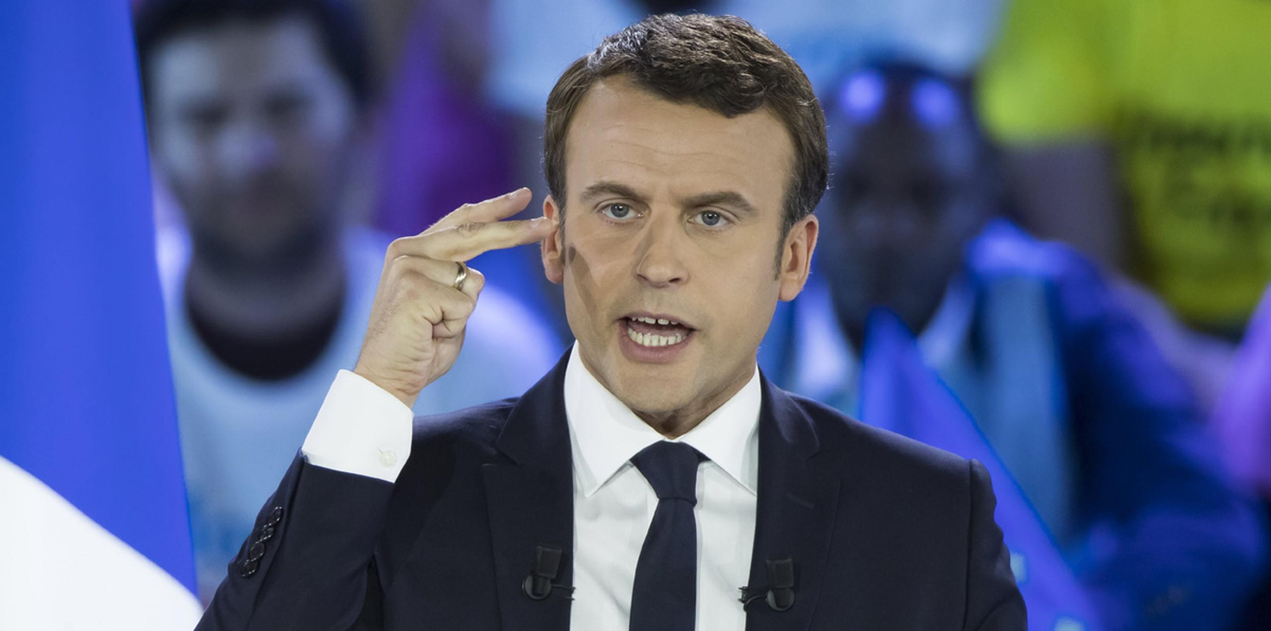 Seis de cada diez futuros votantes de Macron aclaran que lo harán "por defecto" y no por adhesión a sus ideas, frente al 59 % que respaldan a Le Pen por convicción. (AP)