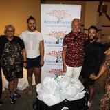 Organizaciones de Nueva York entregan miles de bolsas de compras a familias necesitadas en Puerto Rico