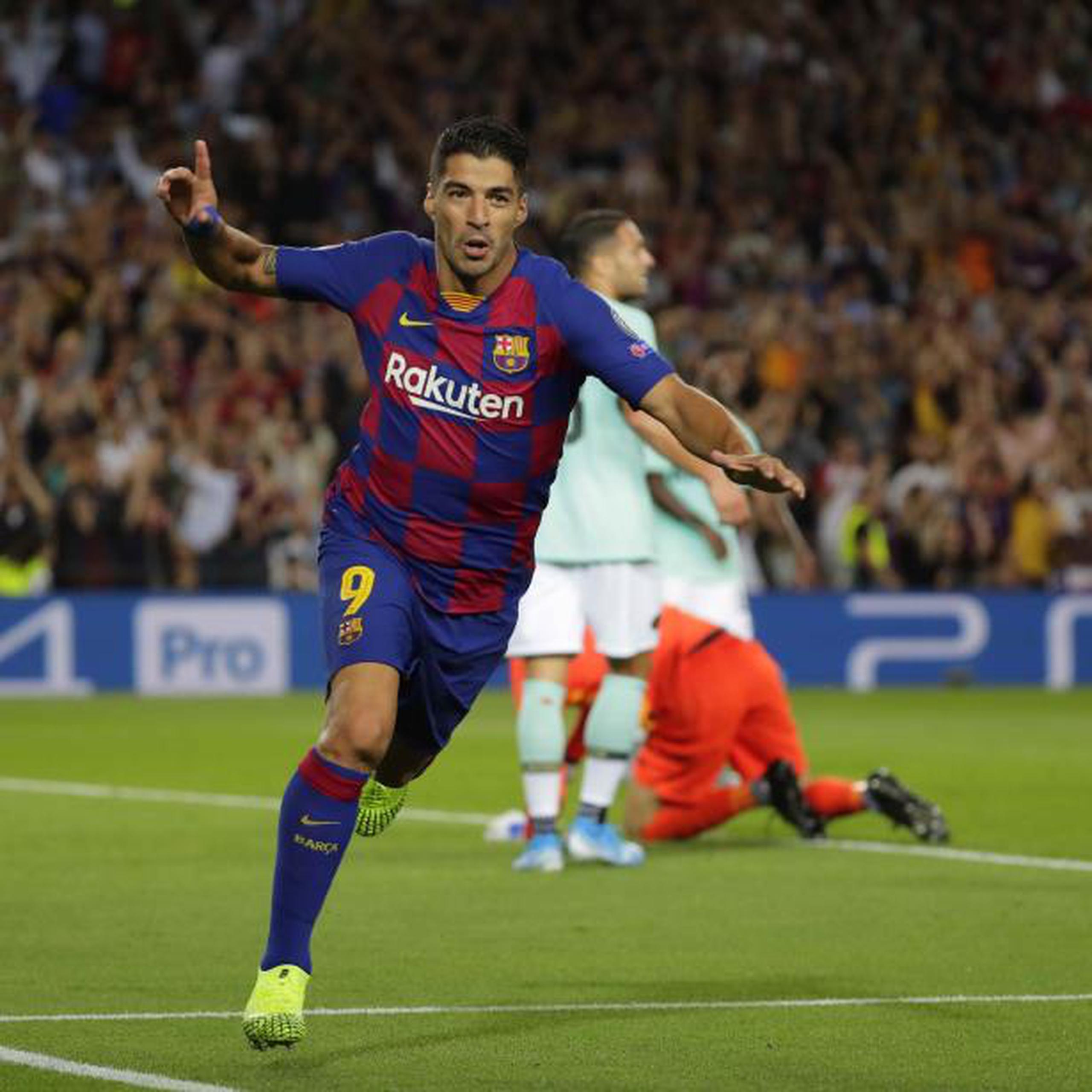 El uruguayo Luis Suárez celebra uno de sus dos goles en la acción del miércoles en la Liga de Campeones. (AP)