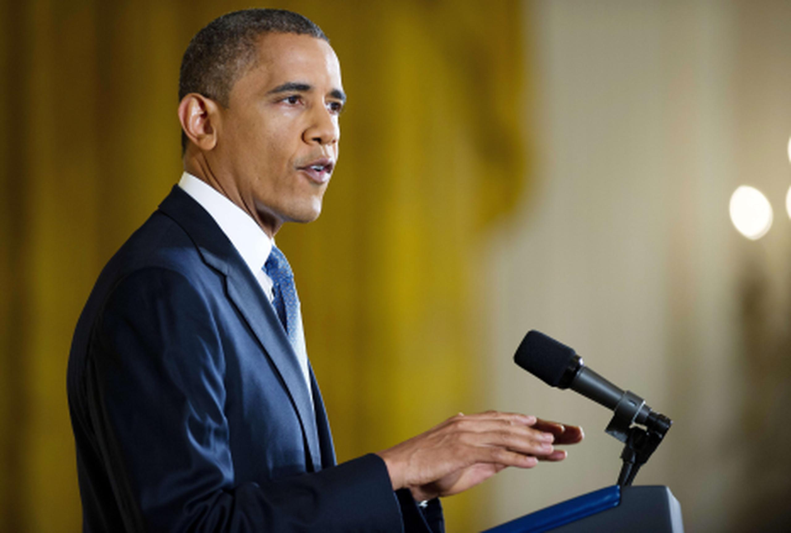 El presidente de EE.UU., Barack Obama, instó hoy al Congreso a que "aproveche el momento" para aprobar una reforma migratoria que permita una "vía" para la legalización de la población indocumentada. (AFP/Jim Watson)