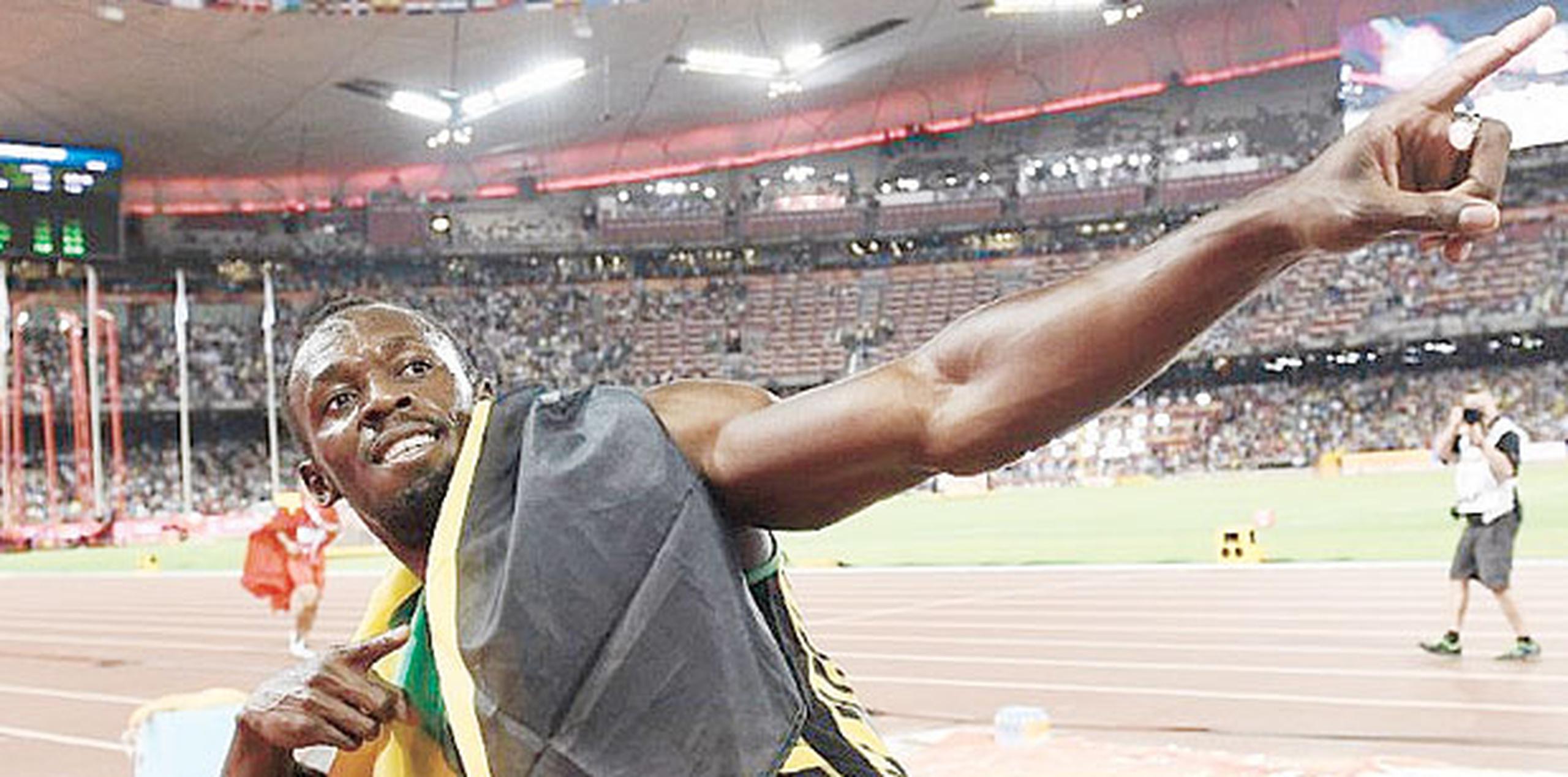 Bolt defendió con éxito en Pekín sus títulos mundiales de 100, 200 y 4x100 metros. (Archivo)