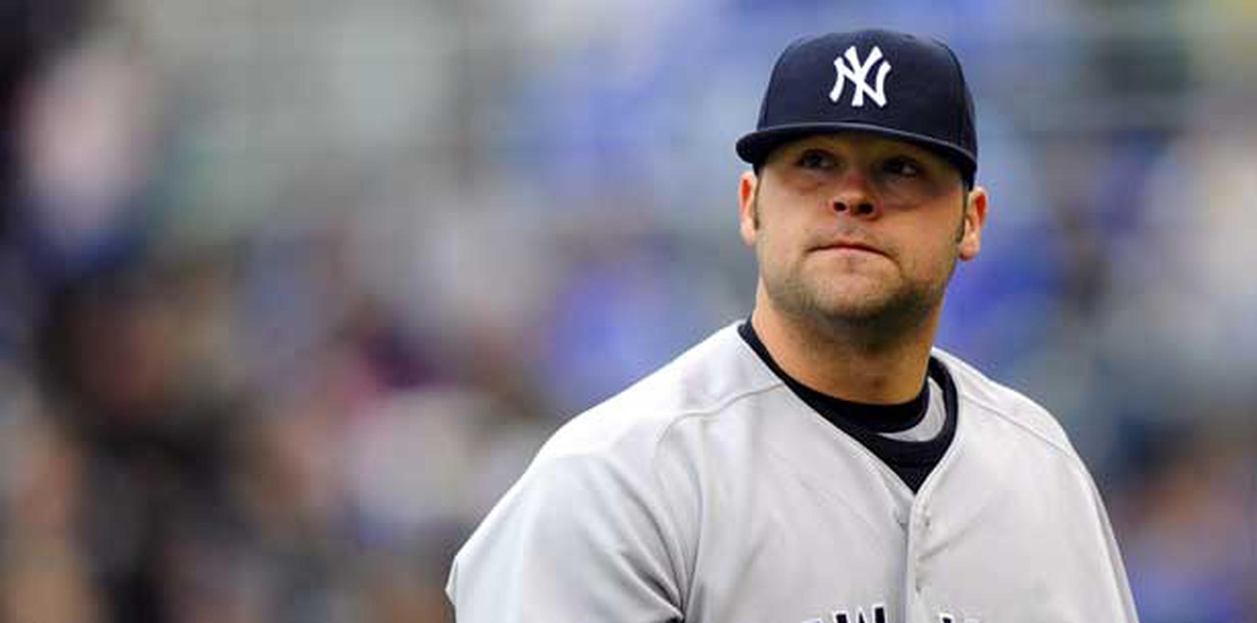 Joba Chamberlain tiene una cicatriz por una cirugía en su brazo derecho. ( EFE/Archivo/Larry W. Smith)