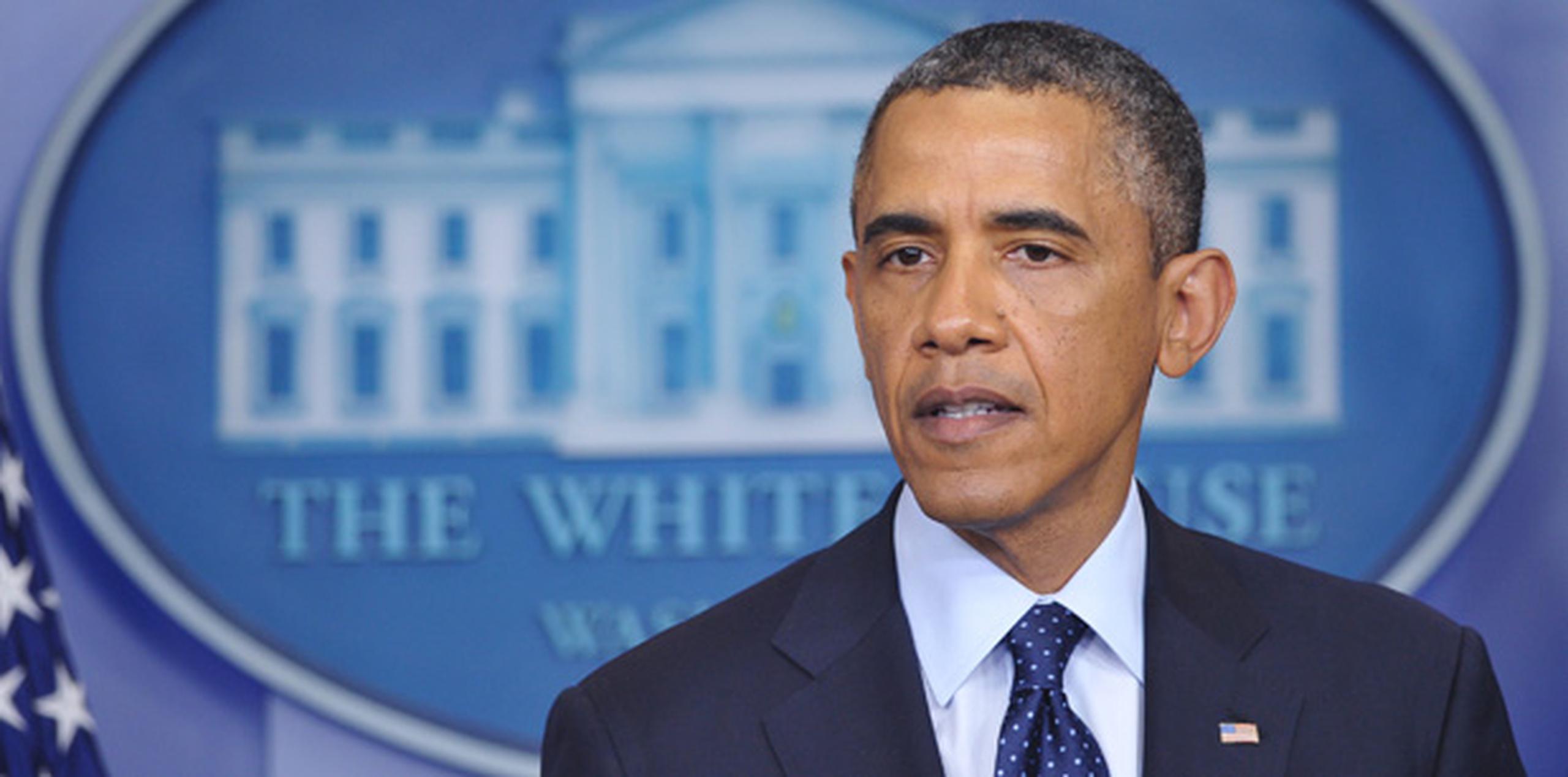 “Encontraremos a quién hizo esto y lo haremos responsable”, expresó Obama en conferencia de prensa. (AFP)