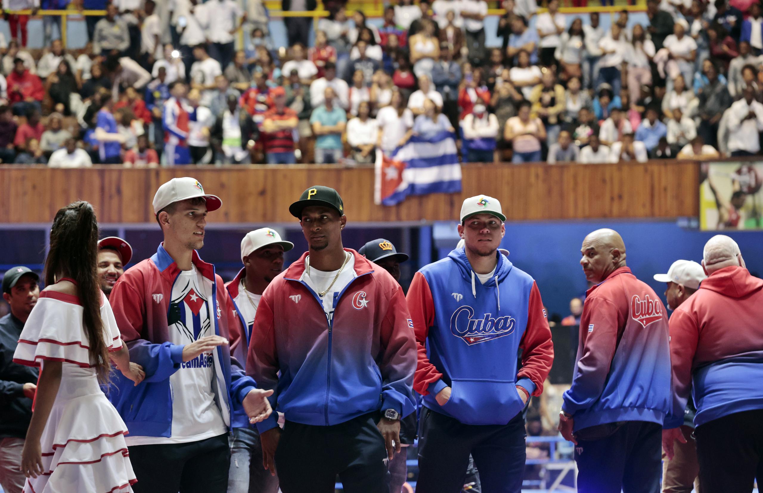 Players of the Cuban team are welcomed during a welcome ceremony today at the Coliseum of the Sports City of Havana.
