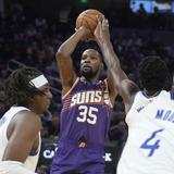 Booker y Durant guiaron a los Suns a triunfo sobre Warriors en inicio de la temporada