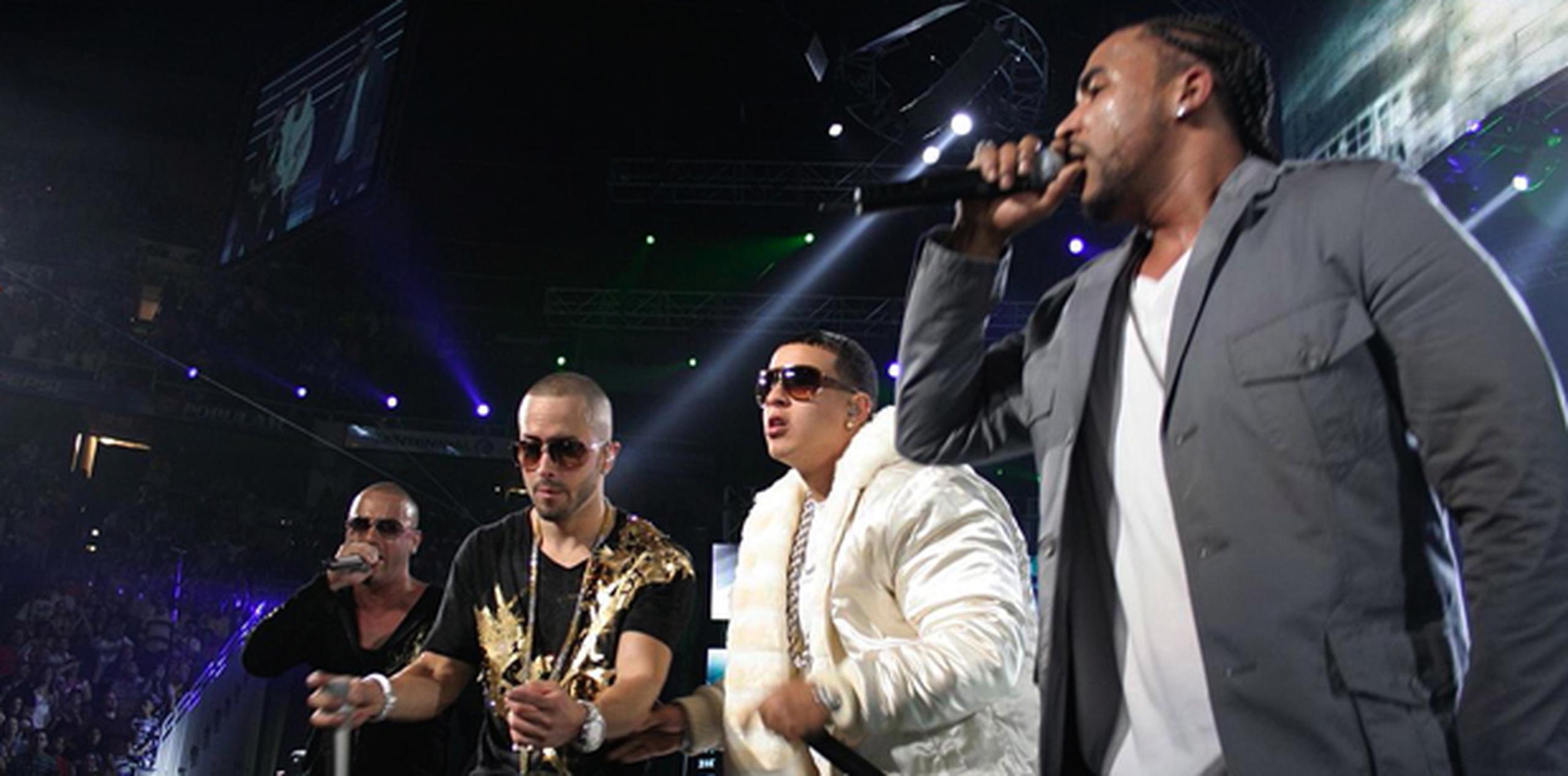 En marzo del 2008, Daddy Yankee y Don Omar aparecieron en tarima junto a Wisin & Yandel en un gesto en el que parecieron limar asperezas. (Archivo)