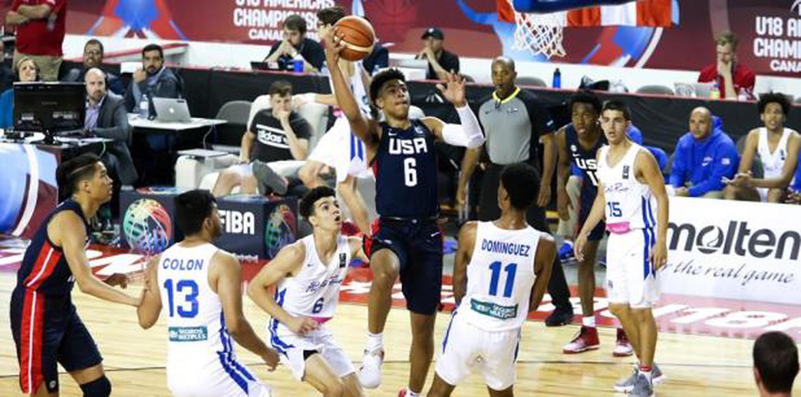 Por Puerto Rico, Giovanni Santiago encabezó el reglón de puntos con 17. (FIBA)