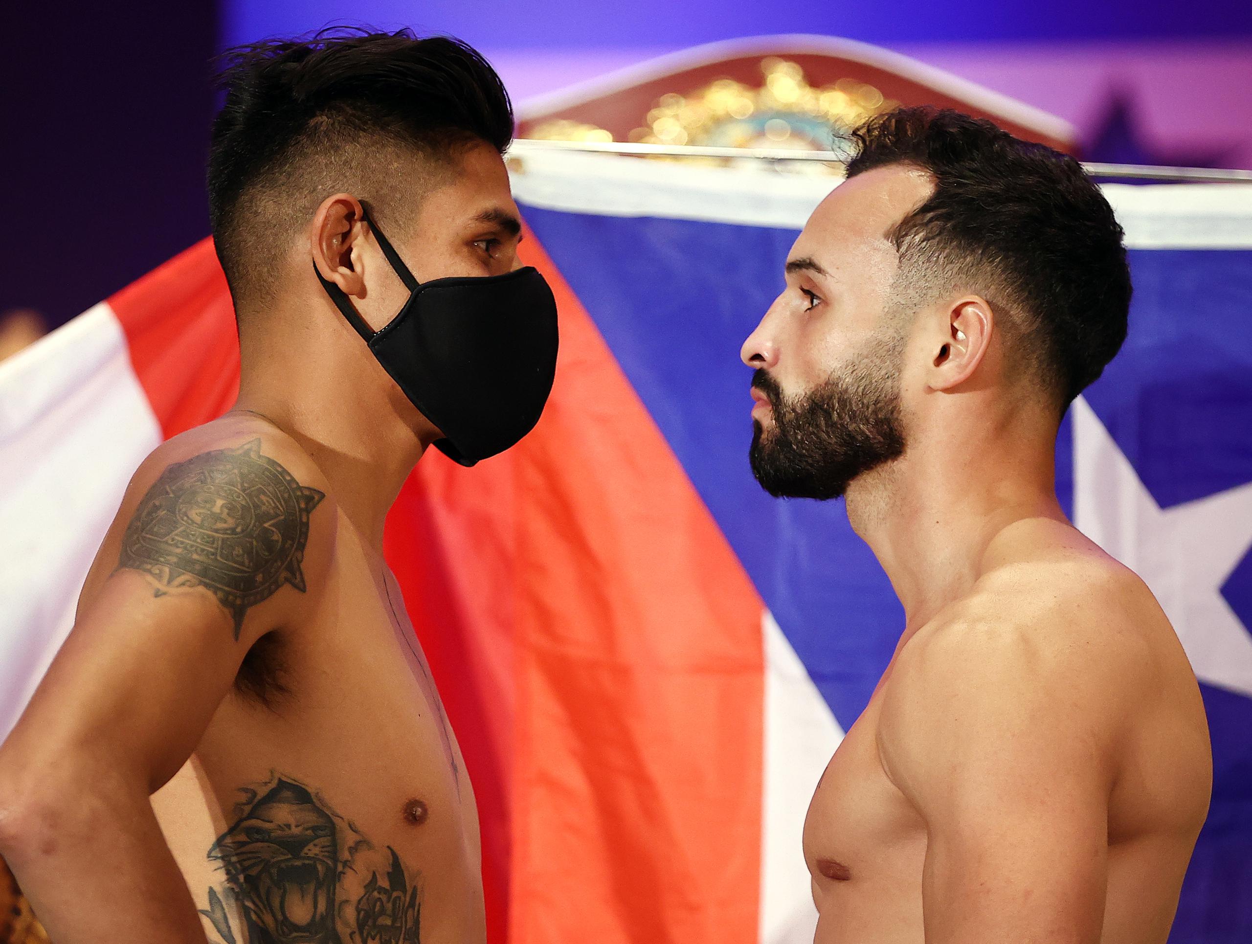 Christopher "Pitufo" Díaz (derecha) buscará por segunda ocasión conquistar la faja pluma de la Organización Mundial de Boxeo (OMB).