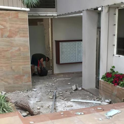 Aterrados ante daños por el terremoto en condominio de Yauco