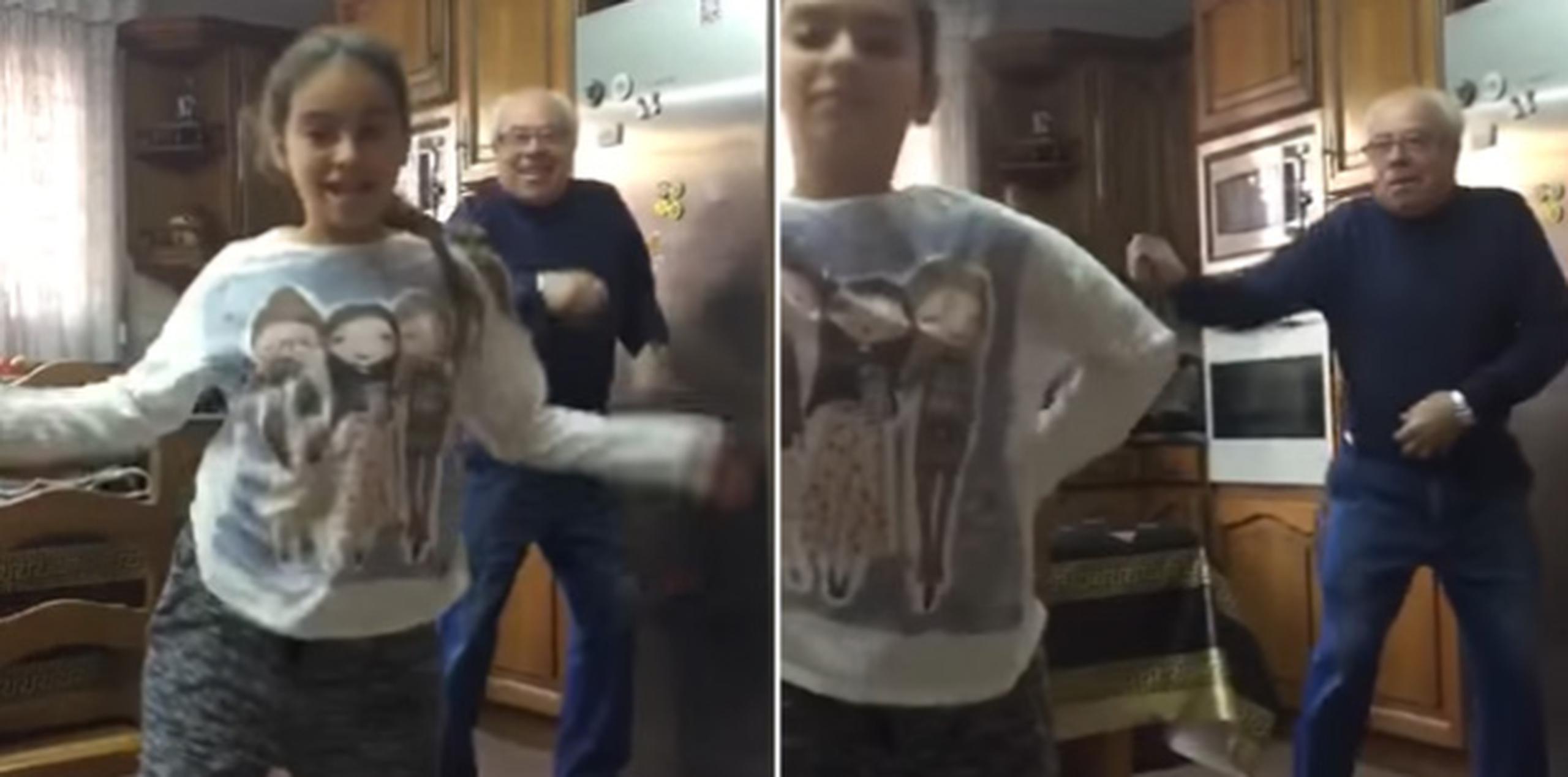 El abuelo le tomó el pelo a su nieta. (YouTube)