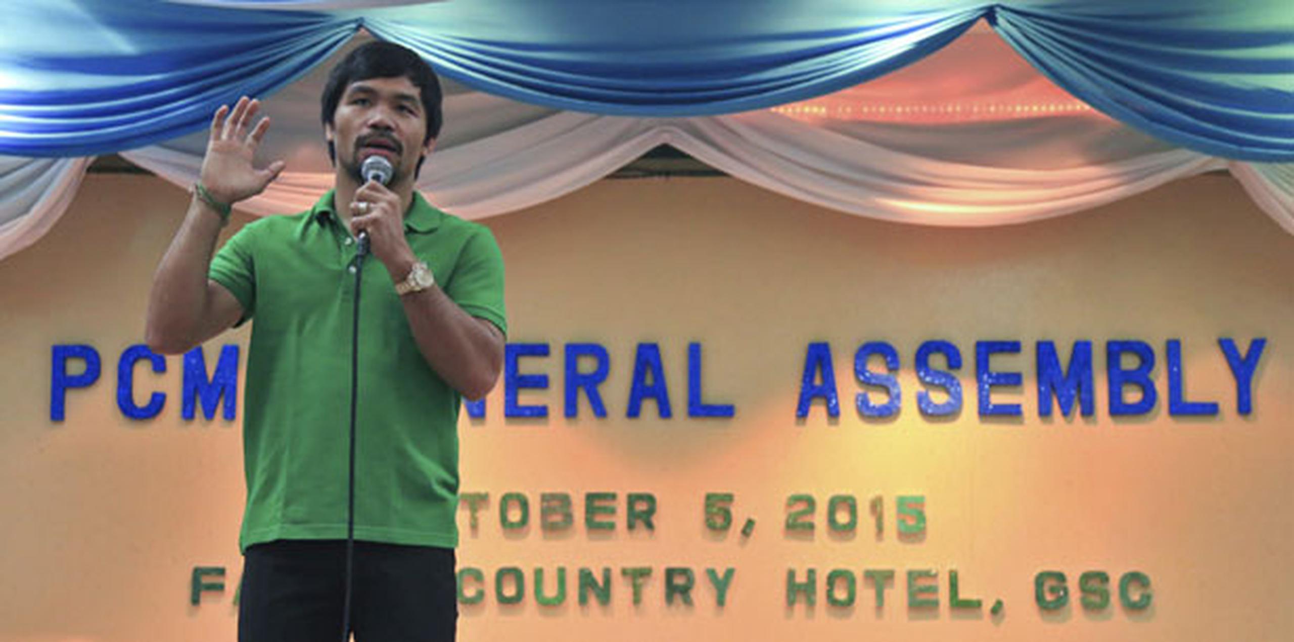 El pugilista, actualmente diputado por la provincia de Sarangani, anunció el lunes pasado que se presentará como candidato al Senado a las elecciones que se celebraran en mayo de 2016 en Filipinas. (EFE/Kim Windell Tiblani)