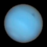 Observan por primera vez desde la Tierra una mancha oscura en Neptuno