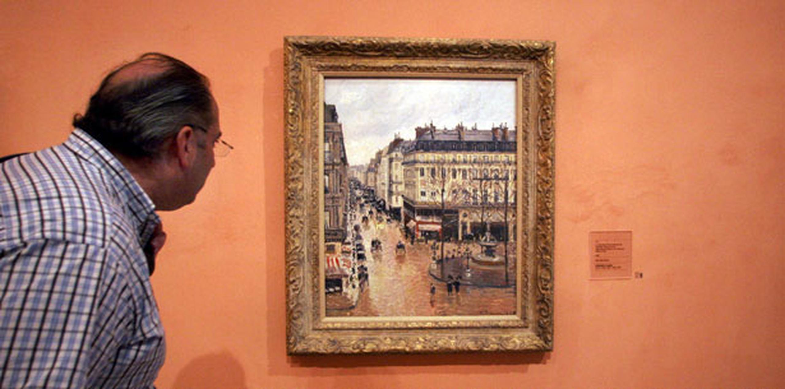 La pintura, "Rue St.-Honore, Apres-Midi, Effet de Pluie", ha sido valorada en 30 millones de dólares o más.  (AP)