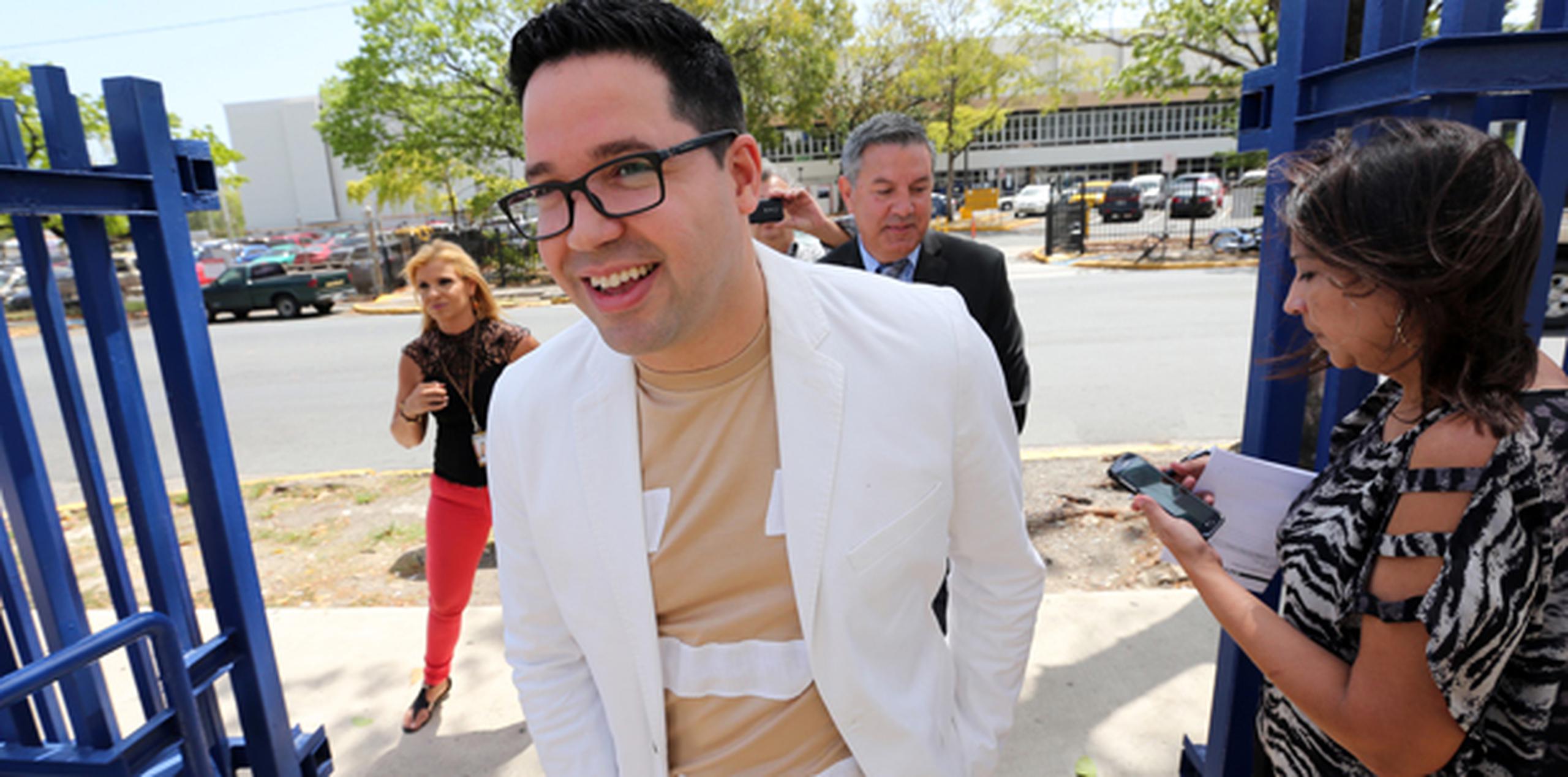 Carrión acudió hoy junto a su abogado, Antonio Figueroa ante el examinador administrativo en la División Legal de la Policía.  (juan.martinez@gfrmedia.com)