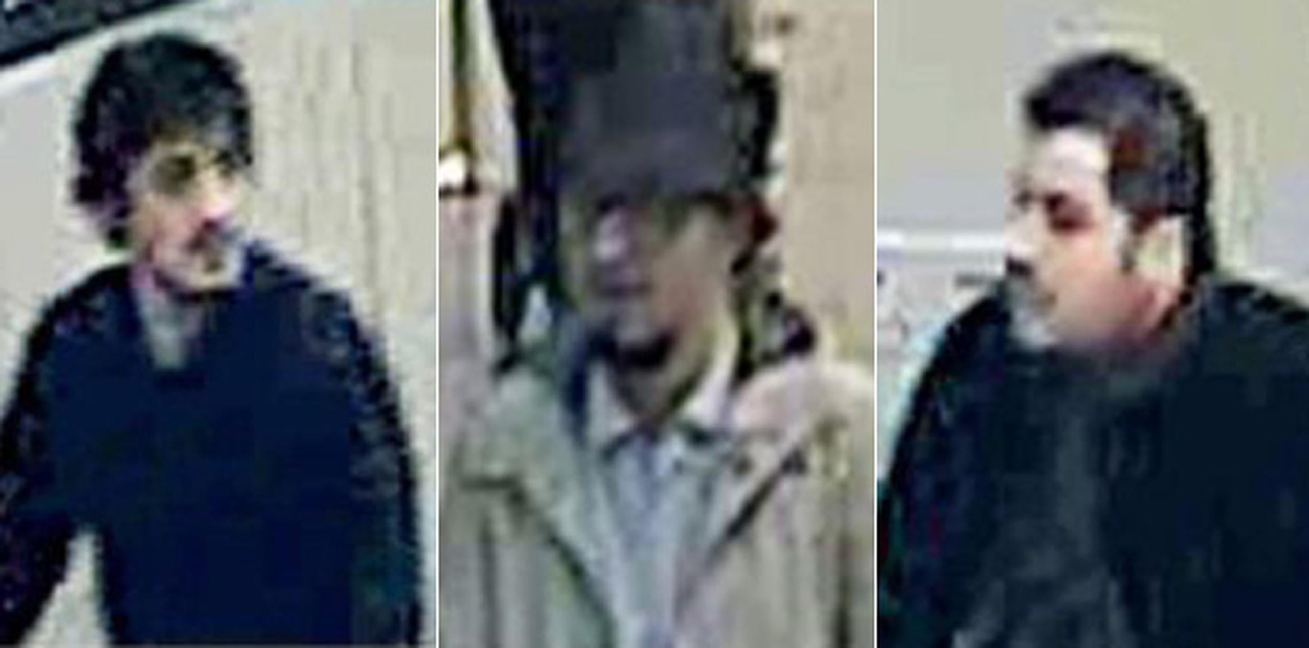 La policía realizó registros durante la noche y publicó una imagen de tres hombres caminando por el aeropuerto con carros portaequipajes en los que podrían llevar las maletas cargadas de explosivos. (AP)
