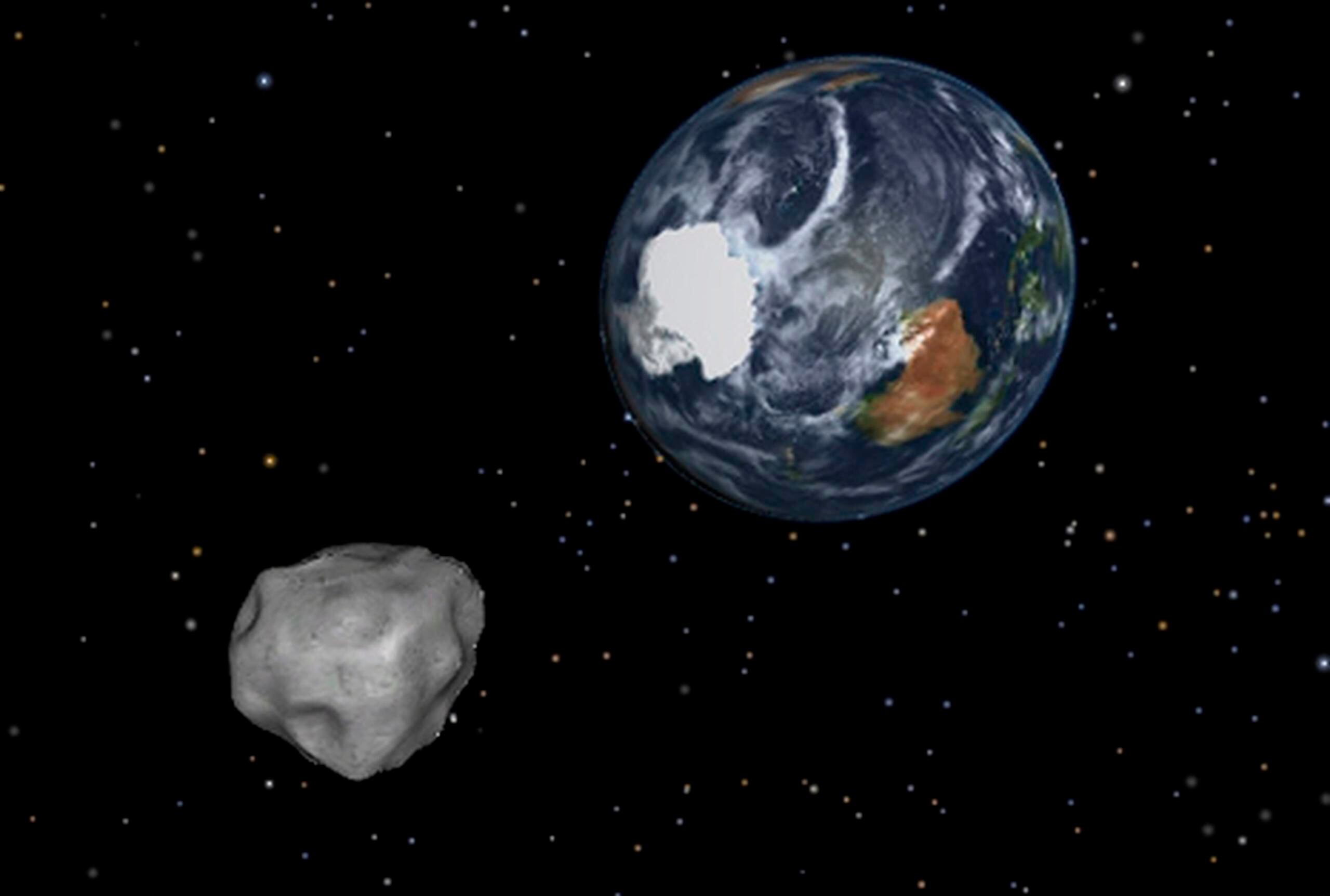 Una representación artística de la aproximación del asteroide 2012 DA14 es necesaria puesto que la roca se vio como un diminuto punto de luz desde la Tierra.&nbsp;<font color="yellow">(AP / NASA / JPL-Caltech)</font>