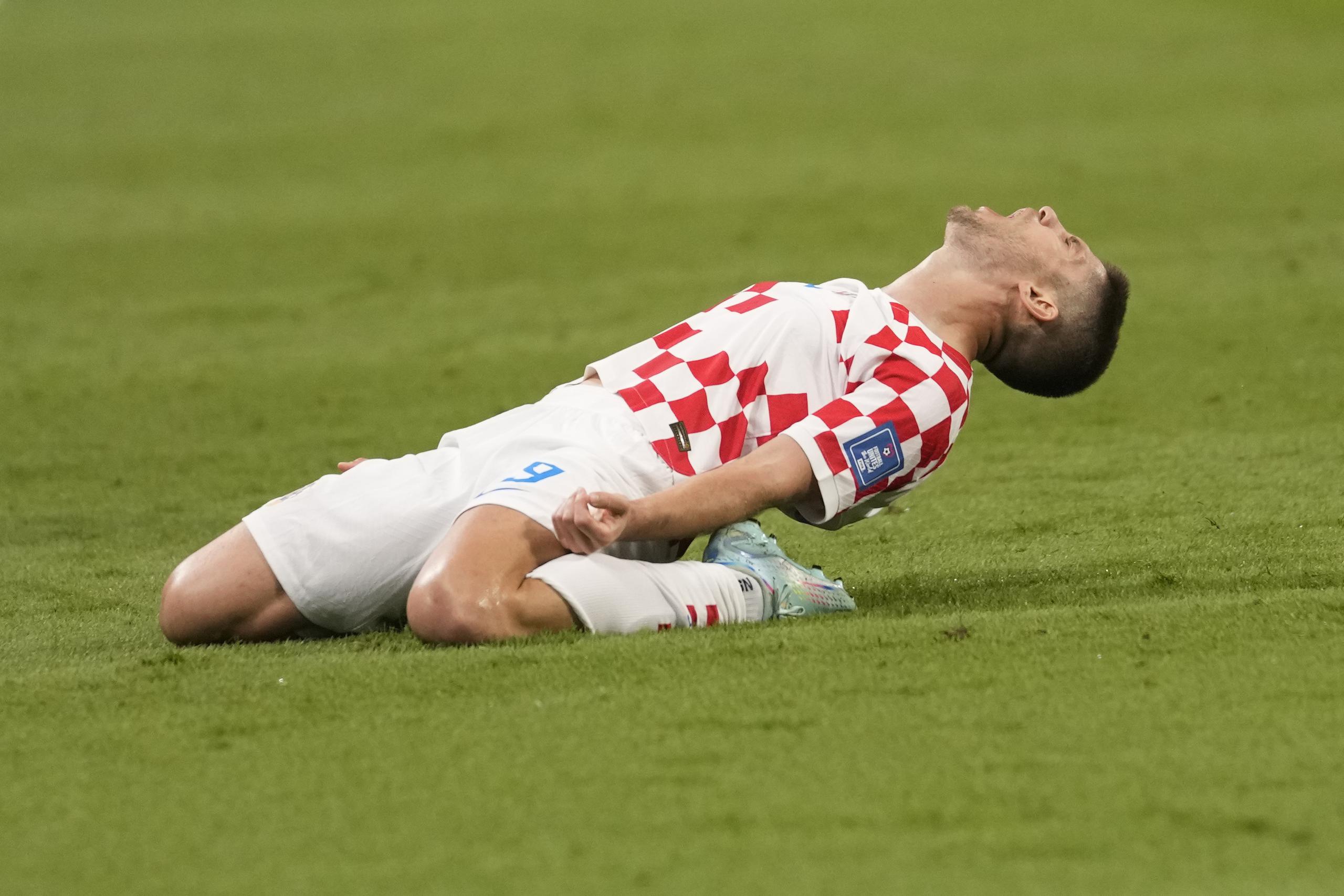 El croata Andrej Kramaric celebra tras anotar el tercer gol en la victoria 4-1 ante Canadá en el partido por el Grupo F del Mundial, el domingo 27 de noviembre de 2022, en Doha, Qatar. (AP Foto/Darko Vojinovic)