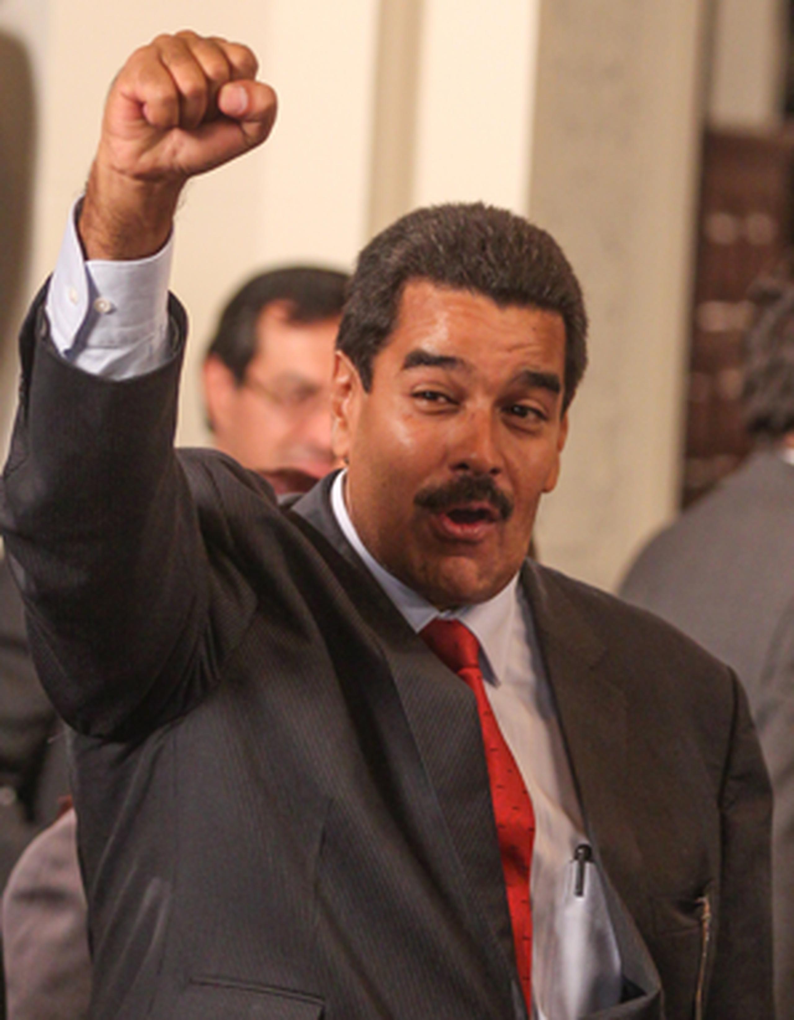 Maduro ganó por un ajustado margen de 1.8 puntos porcentuales. (AFP)