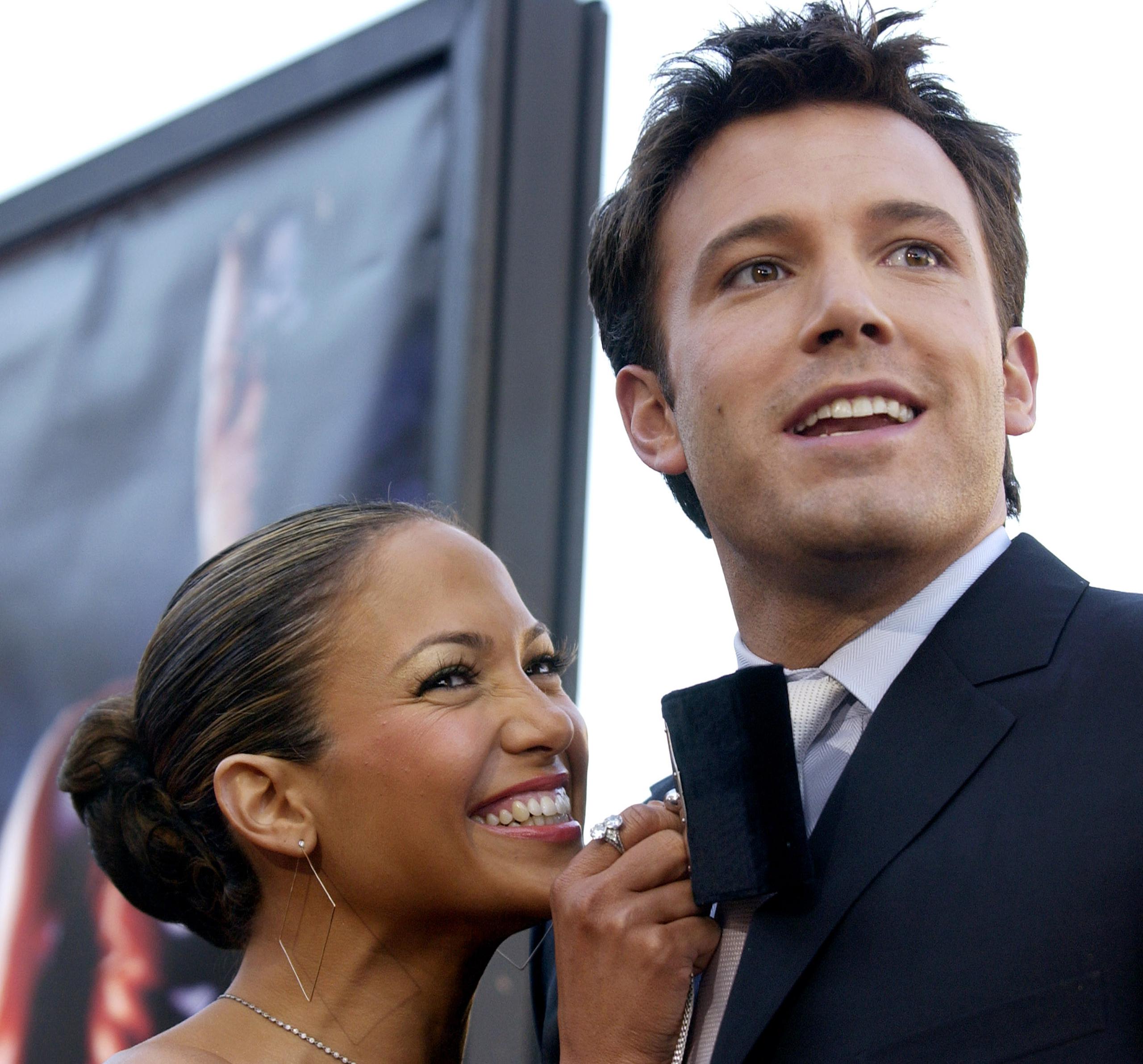 "Daredevil" star Ben Affleck, accompanied by his fiancee Jennifer Lopez, attends the premiere of the film in the Westwood section of Los Angeles, Sunday, Feb. 9, 2003. (AP Photo/Chris Pizzello)
