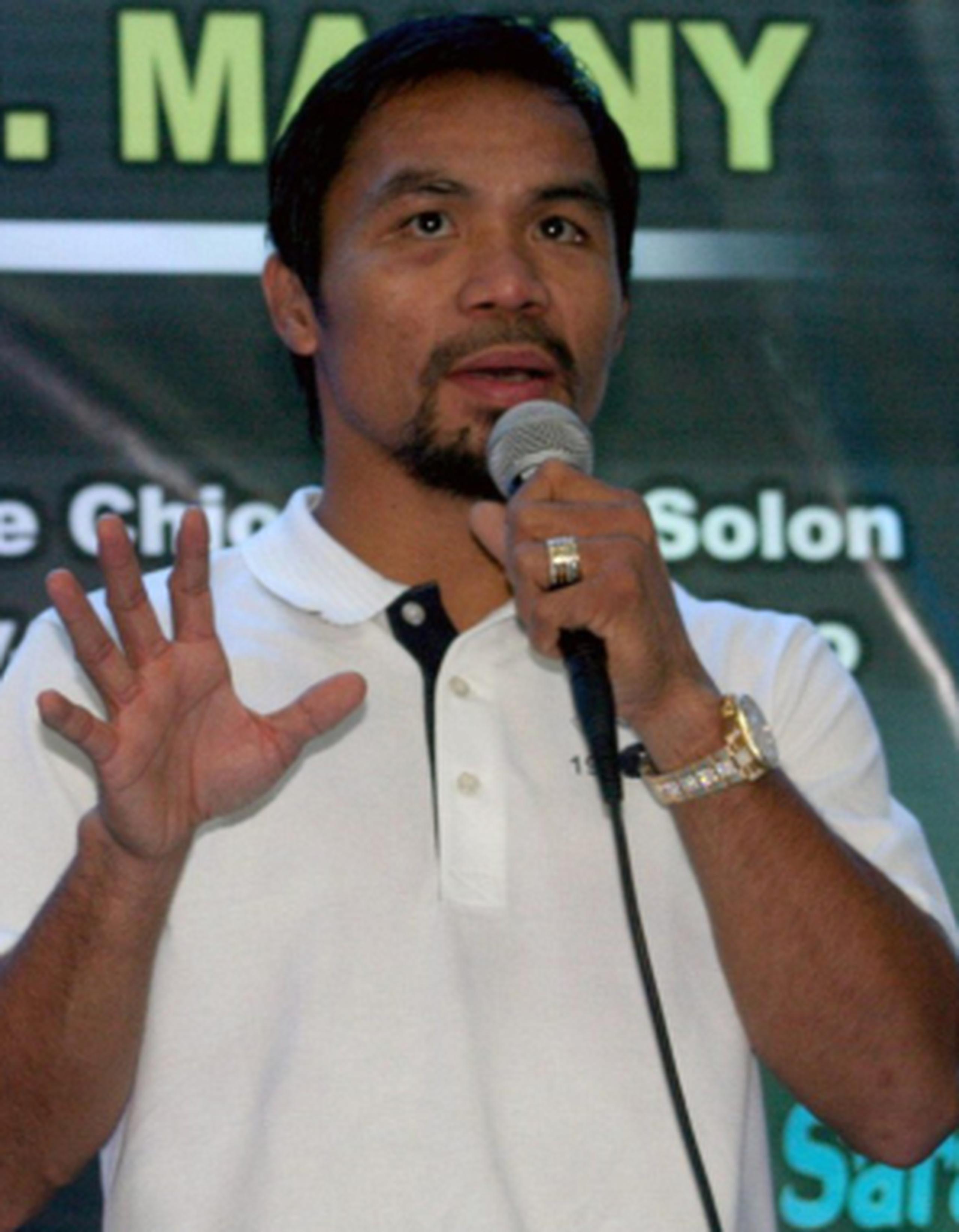 Manny Pacquiao dedicó su victoria a su país. (AP)
