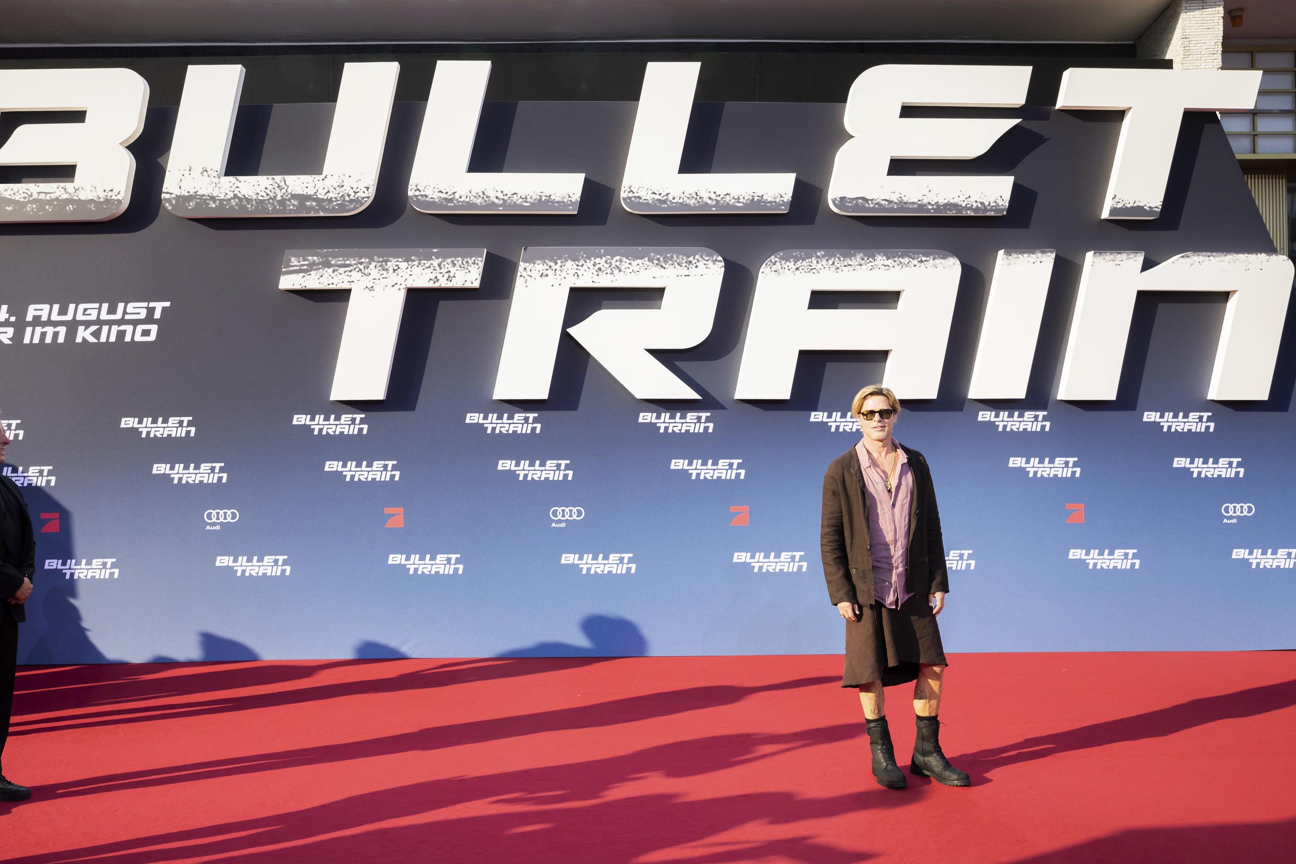 Brad Pitt walks the red carpet for the movie "Bullet Train" at the Zoopalast, Berlin, Tuesday, July 19, 2022. (Christoph Soeder/dpa via AP)