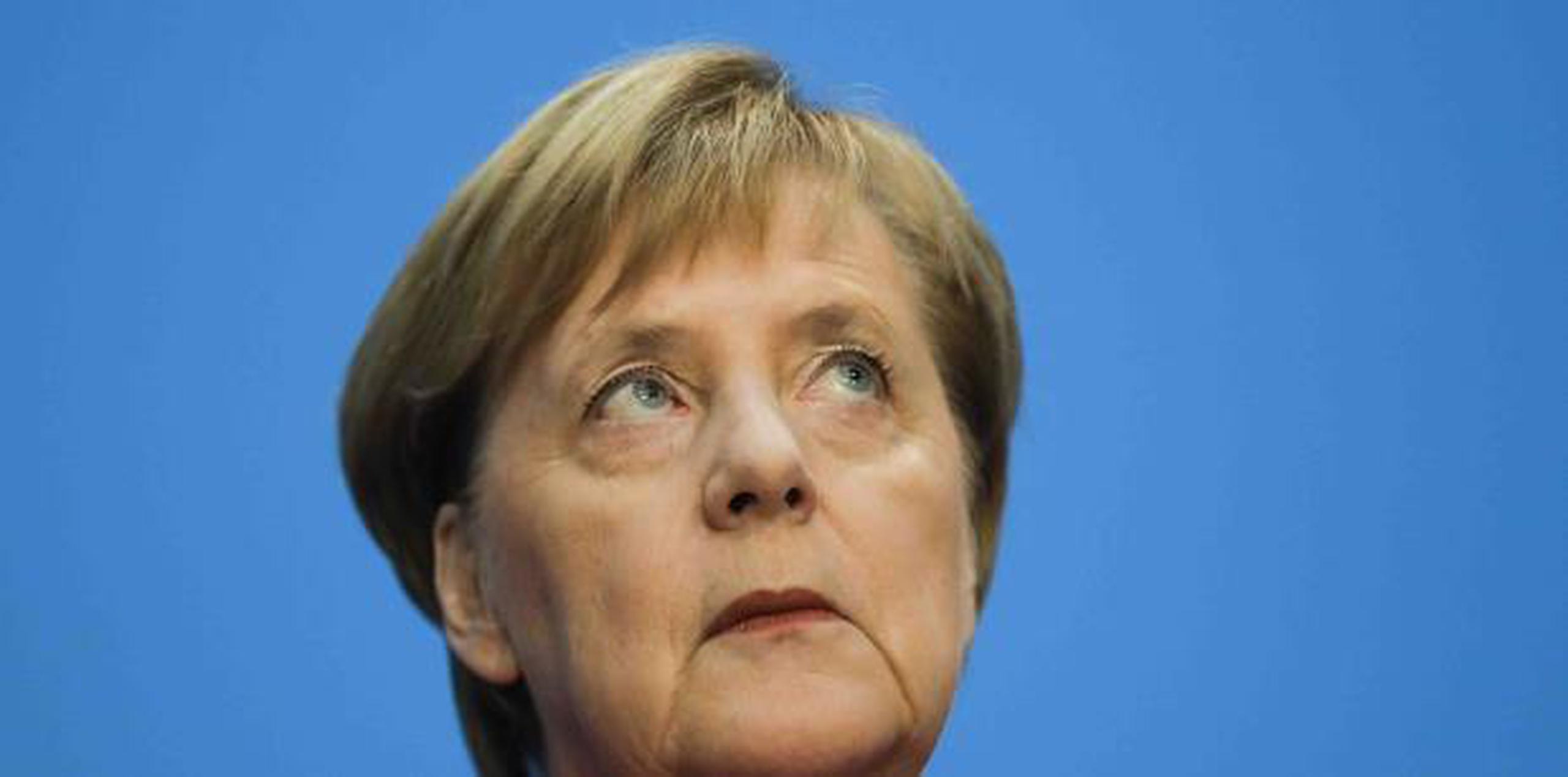 El anuncio de Merkel ocurre luego de derrotas electorales  a nivel regional de su coalición. (AP)