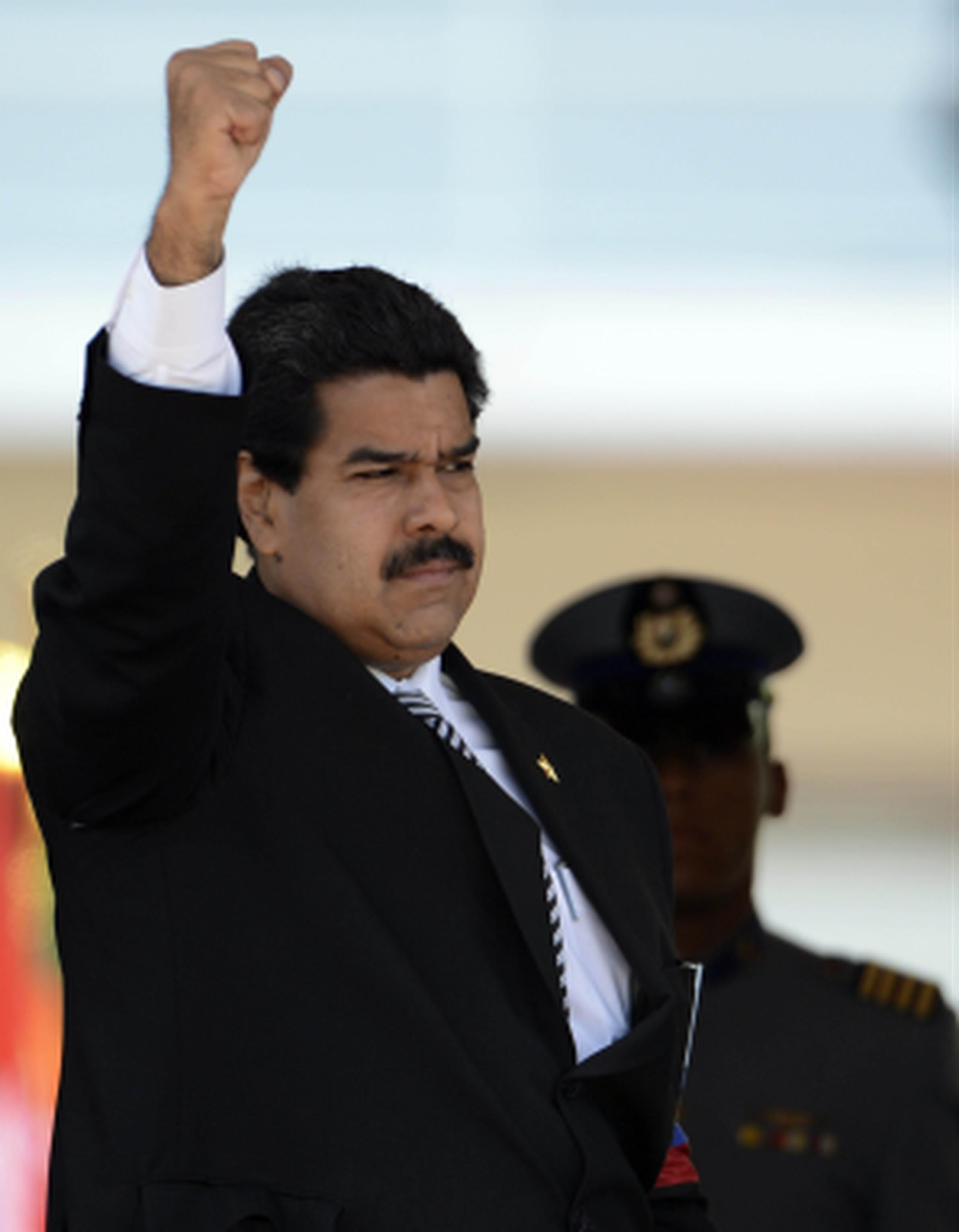 Horas antes de que Maduro sea juramentado por la Asamblea Nacional como presidente encargado, y en medio de los actos fúnebres de Chávez, el máximo tribunal difundió la sentencia. (AFP)