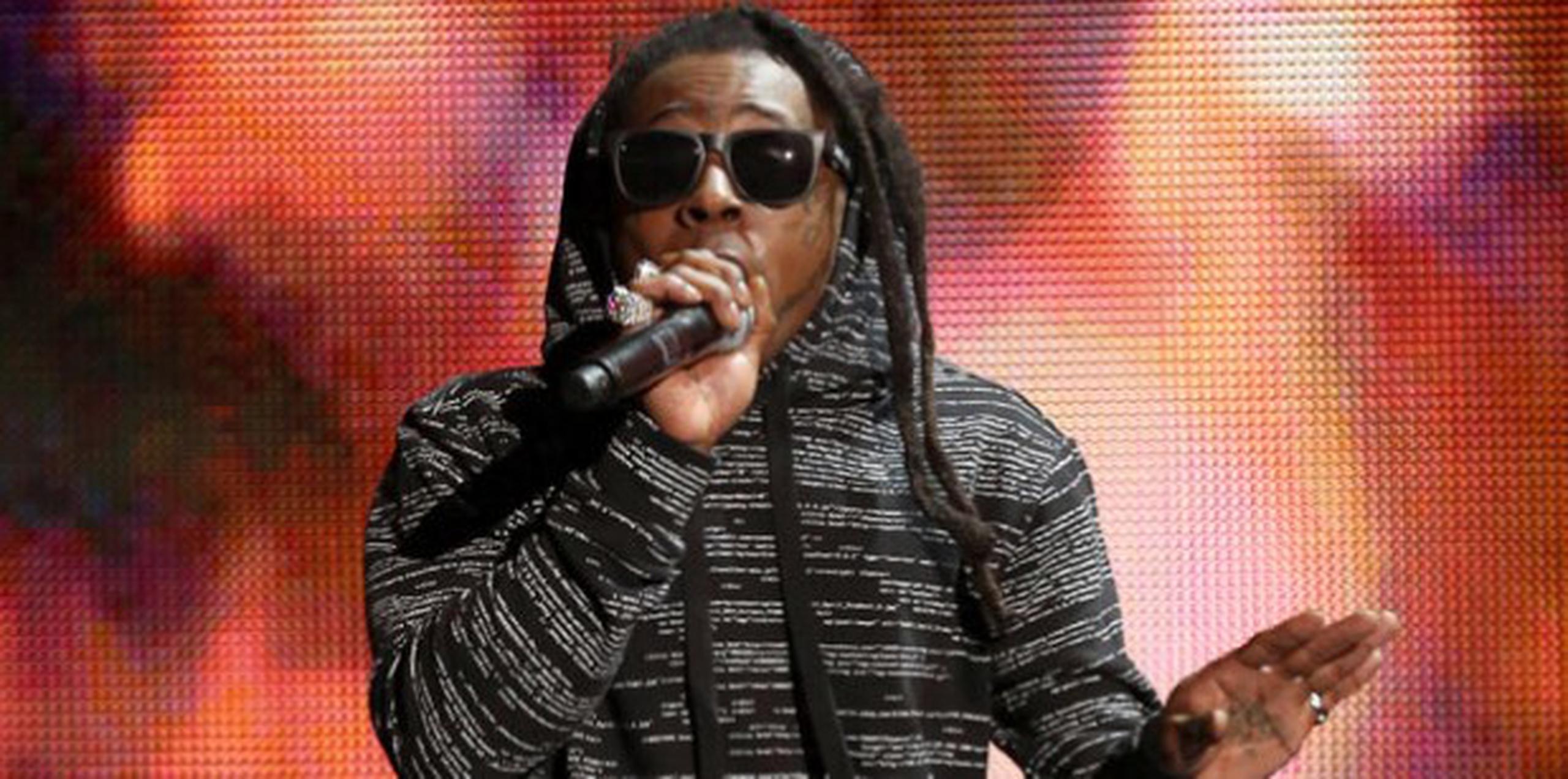 El cibersitio de Cash Money está promocionando el próximo lanzamiento del disco que Lil Wayne terminó el mes pasado.  (Photo by Matt Sayles/Invision/AP, FIle)