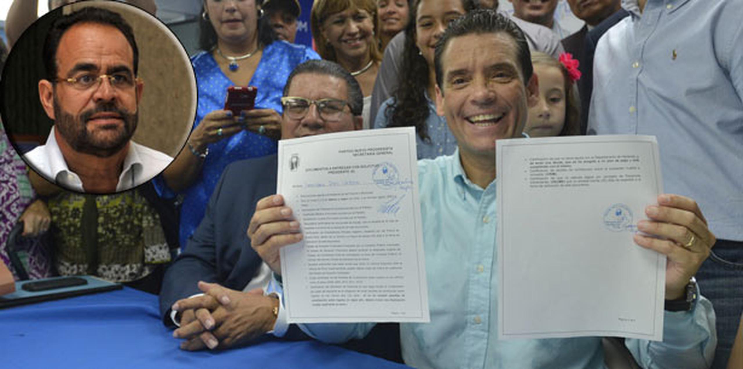 El ex representante Leo Díaz, quien presentó el domingo su candidatura formal a la presidencia del PNP en San Juan, recibe ayuda del alcalde toabajeño Aníbal Vega Borges (recuadro). (Archivo)
