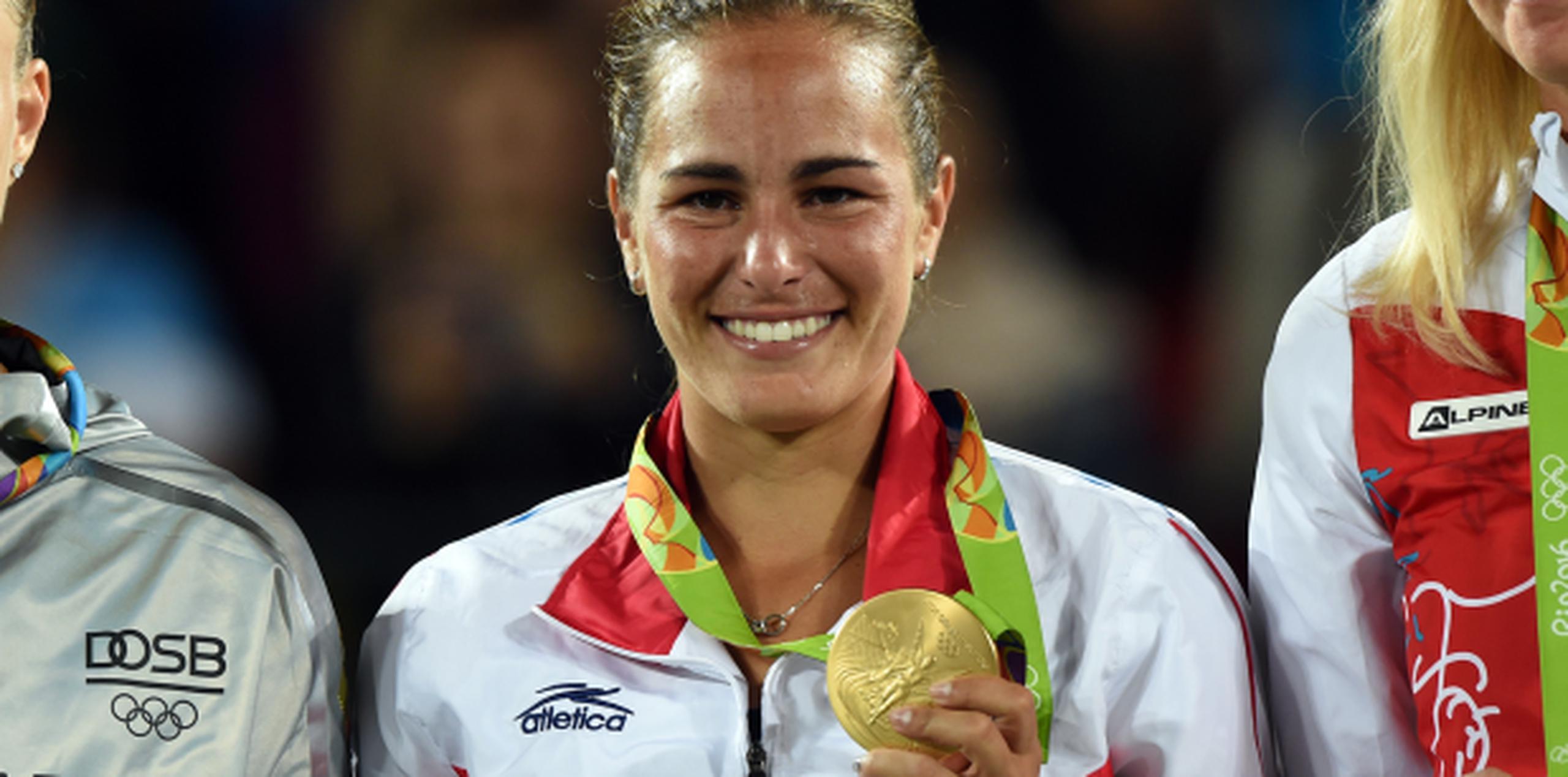 Mónica Puig fue la primera mujer bajo la bandera de Puerto Rico en ganar medalla en unas Olimpiadas. (Andre Kang)