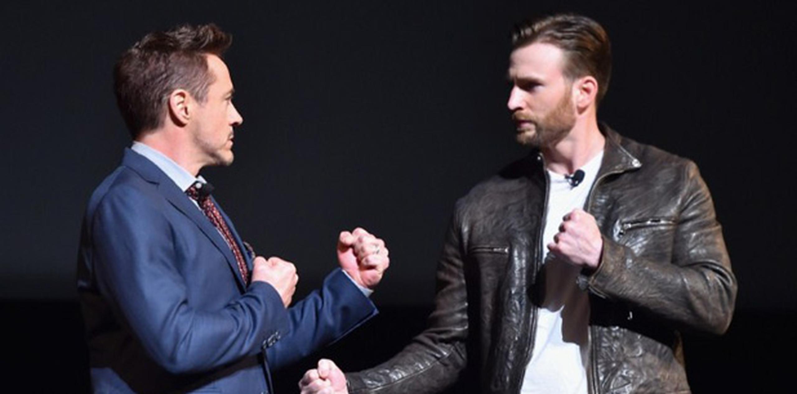 Los actores Robert Downey Jr. y Chris Evans, quienes interpretan a Iron Man y Captain America, respectivamente, estuvieron presentes para el anuncio que se hizo ayer en el teatro El Capitán de Los Ángeles. (AFP)