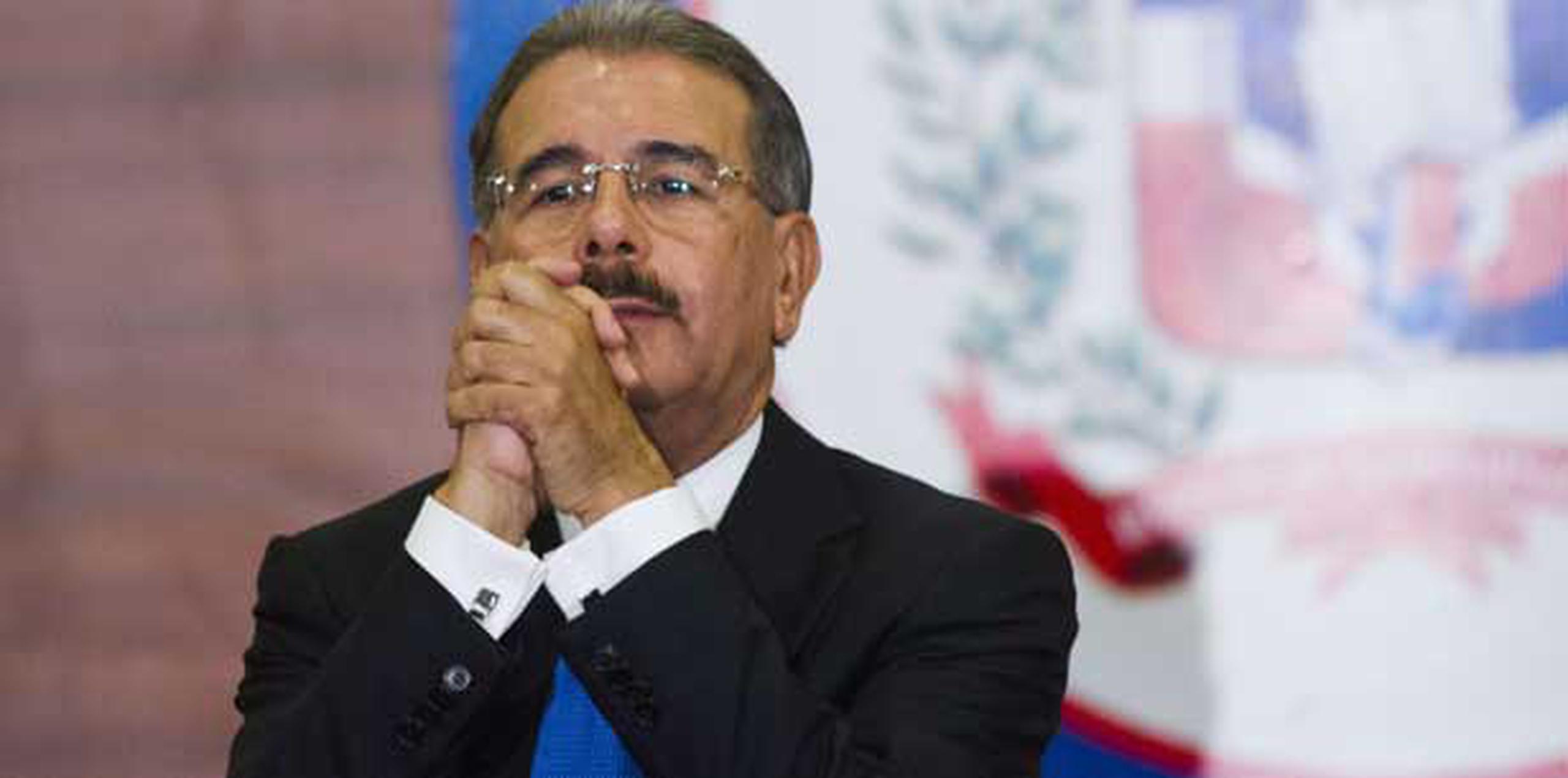El presidente Danilo Medina ha prometido invertir 4% del PIB en educación, más que gobiernos previos en el país de 9 millones de habitantes. (AFP / Archivo/ Erika Santelices)