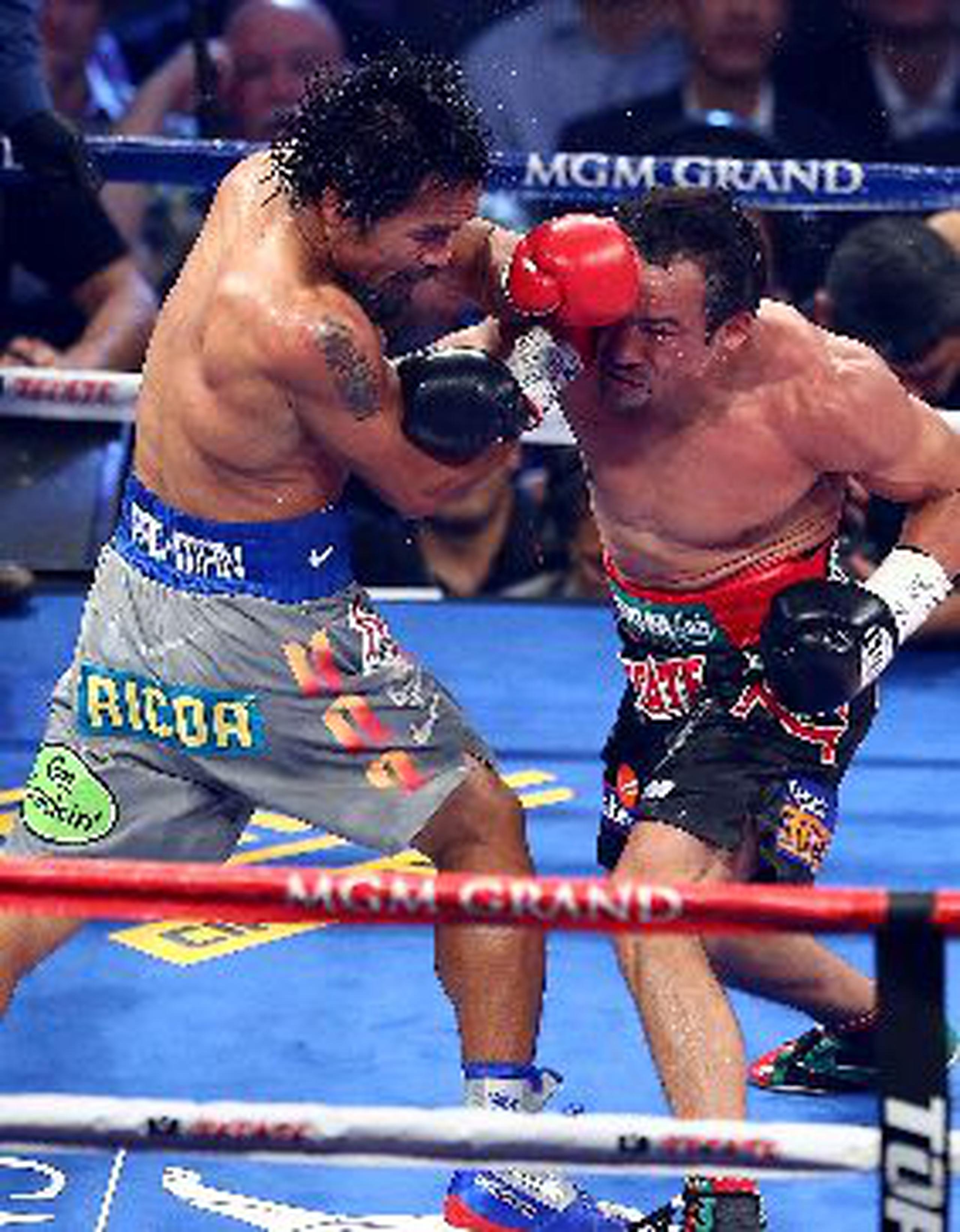 Manny Pacquiao, a la izquierda, peleó y perdió el pasado 8 de diciembre ante Juan Manuel Márquez.&nbsp;<font color="yellow">(Archivo)</font>