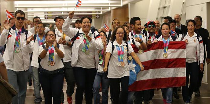 Puerto Rico viajó a Los Ángeles con un total de 54 atletas, y 53 de ellos regresaron anoche a la Isla con medallas en sus cuellos. (jose.candelaria@gfrmedia.com)