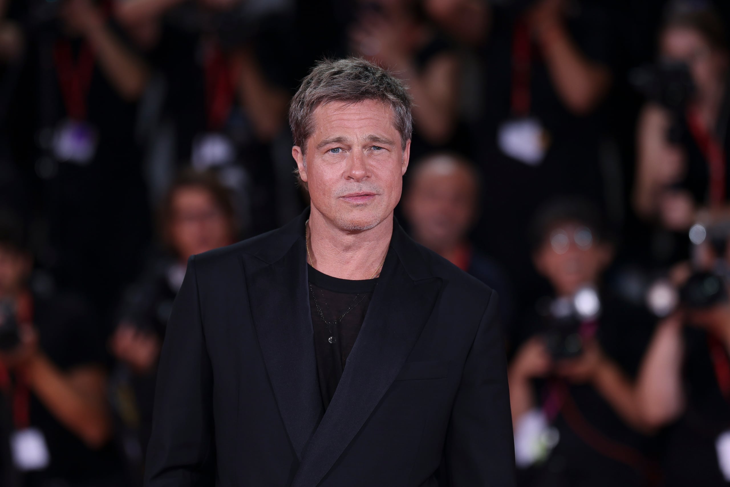 Brad Pitt poses for photographers upon arrival for the premiere of the film 'Wolfs' during the 81st edition of the Venice Film Festival in Venice, Italy, on Sunday, Sept. 1, 2024. (Photo by Vianney Le Caer/Invision/AP)