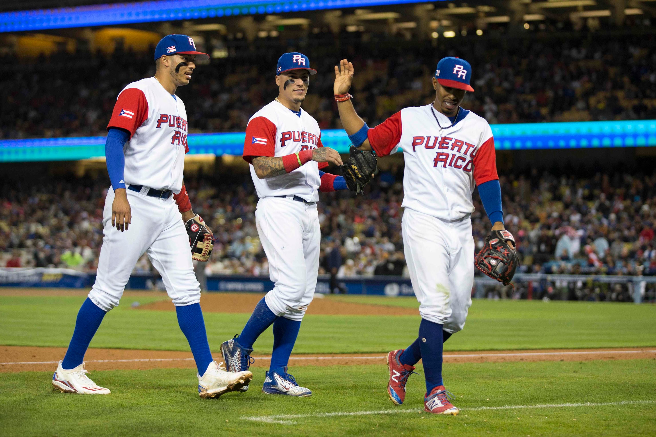 Carlos Correa, Javier Báez y Francisco Lindor.
