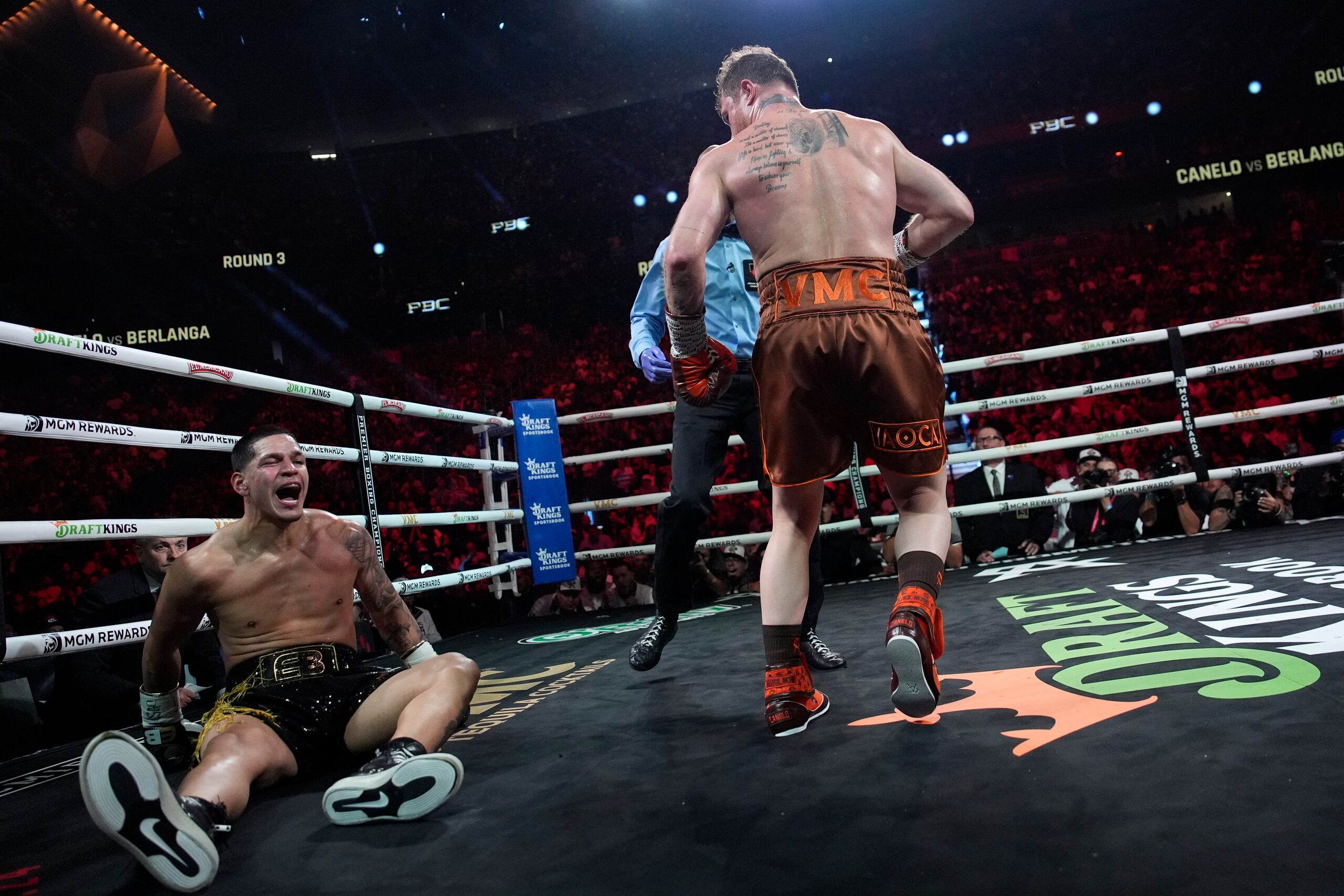 Canelo Alvarez knocks down Edgar Berlanga in a super middleweight title bout Saturday, Sept. 14, 2024, in Las Vegas. (AP Photo/John Locher)