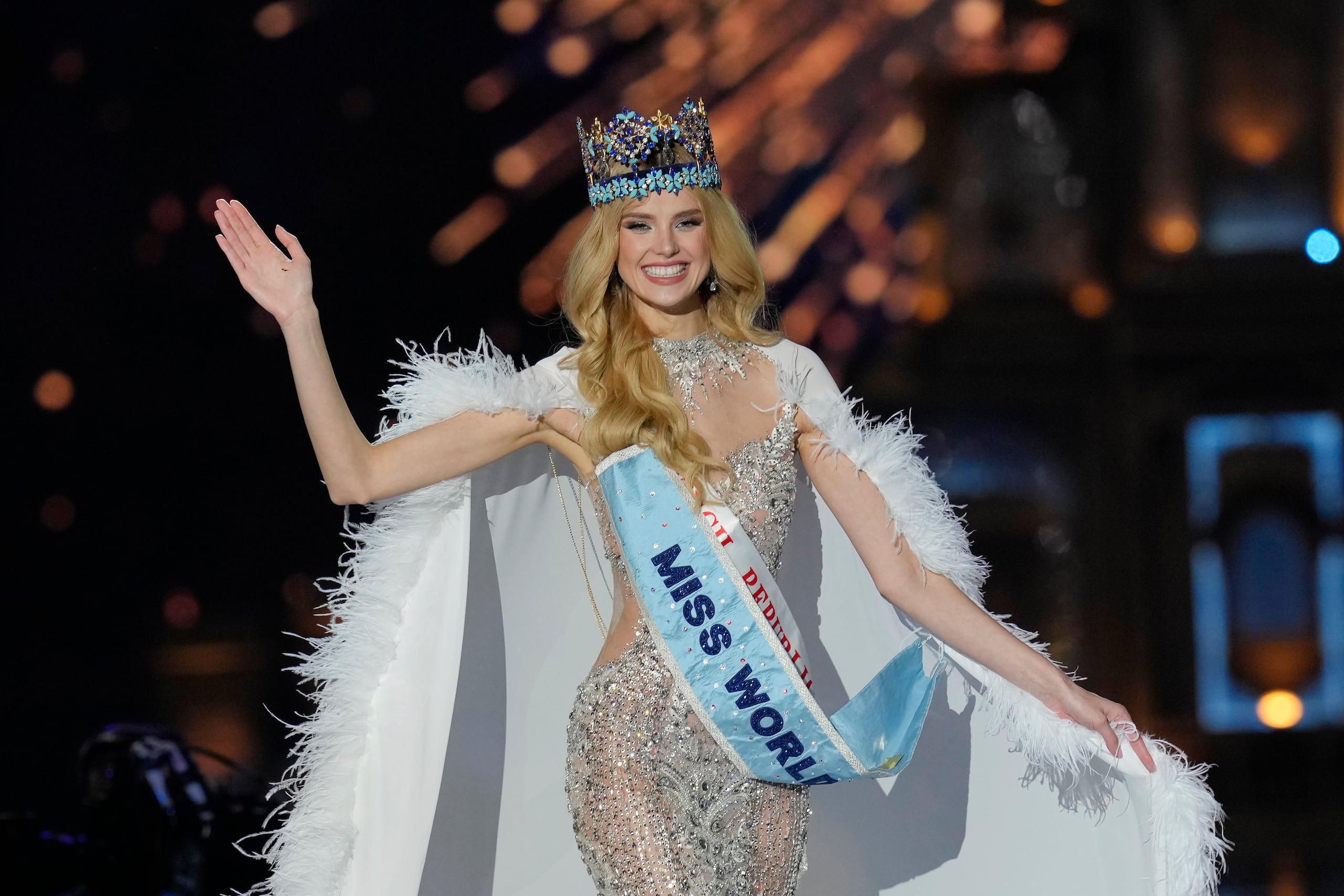 Krystyna Pyszková of Czech Republic waves after she was crowned Miss World in Mumbai, India, Saturday, Mar. 9, 2024. (AP Photo/Rajanish Kakade)