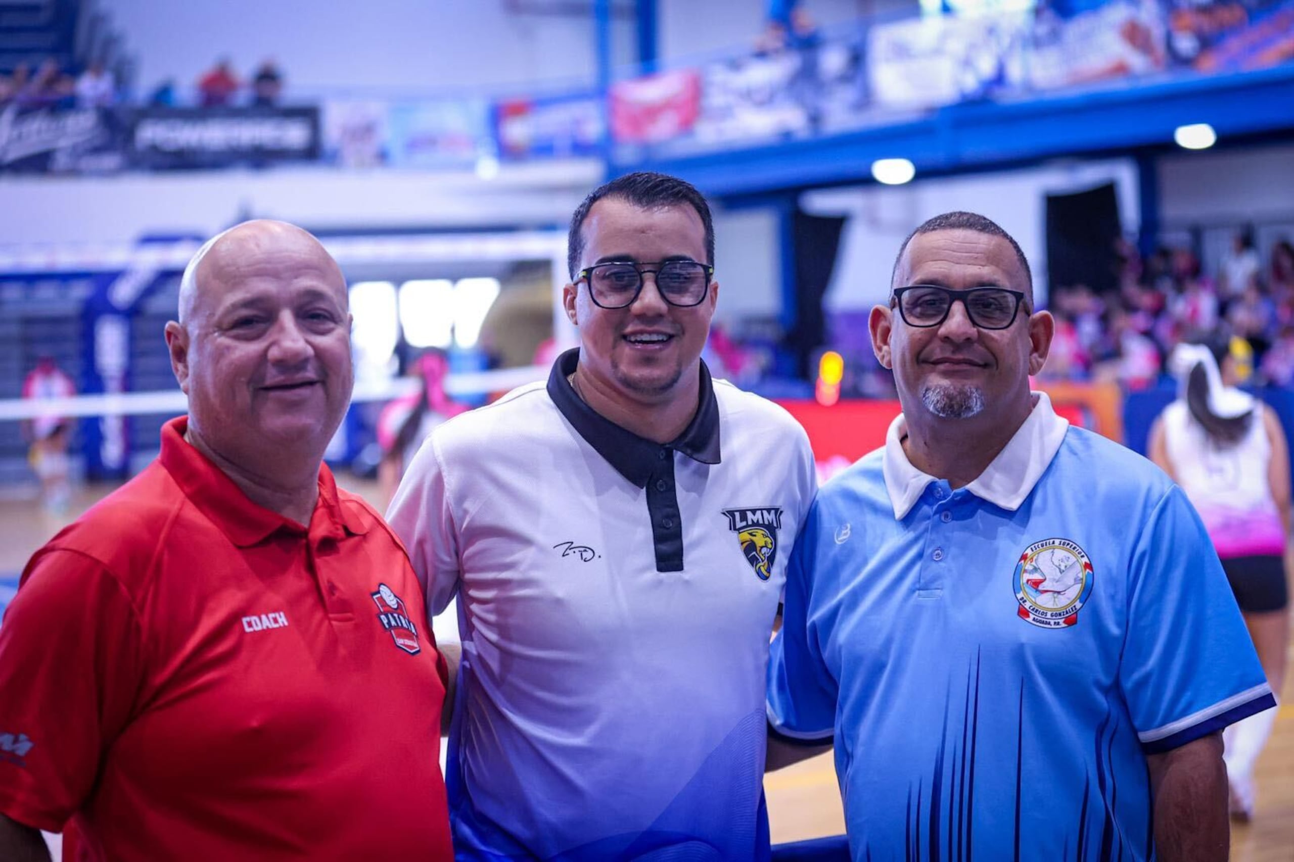 De izquierda a derecha, los maestros de educación física Pablo Torres, Jeffrey Ortiz e Iván Acevedo.