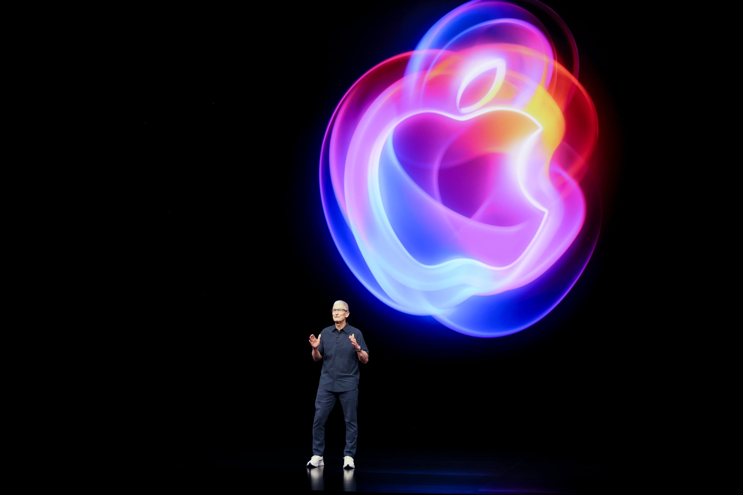 Apple CEO Tim Cook talks on the stage during an announcement of new products at Apple headquarters Monday, Sept. 9, 2024, in Cupertino, Calif. (AP Photo/Juliana Yamada)