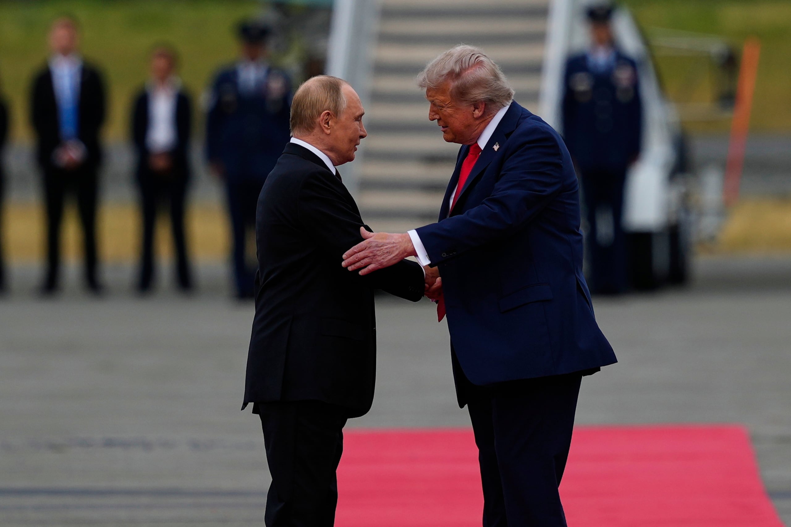 President Donald Trump greets Russia's President Vladimir Putin Friday, Aug. 15, 2025, at Joint Base Elmendorf-Richardson, Alaska. (AP Photo/Julia Demaree Nikhinson)