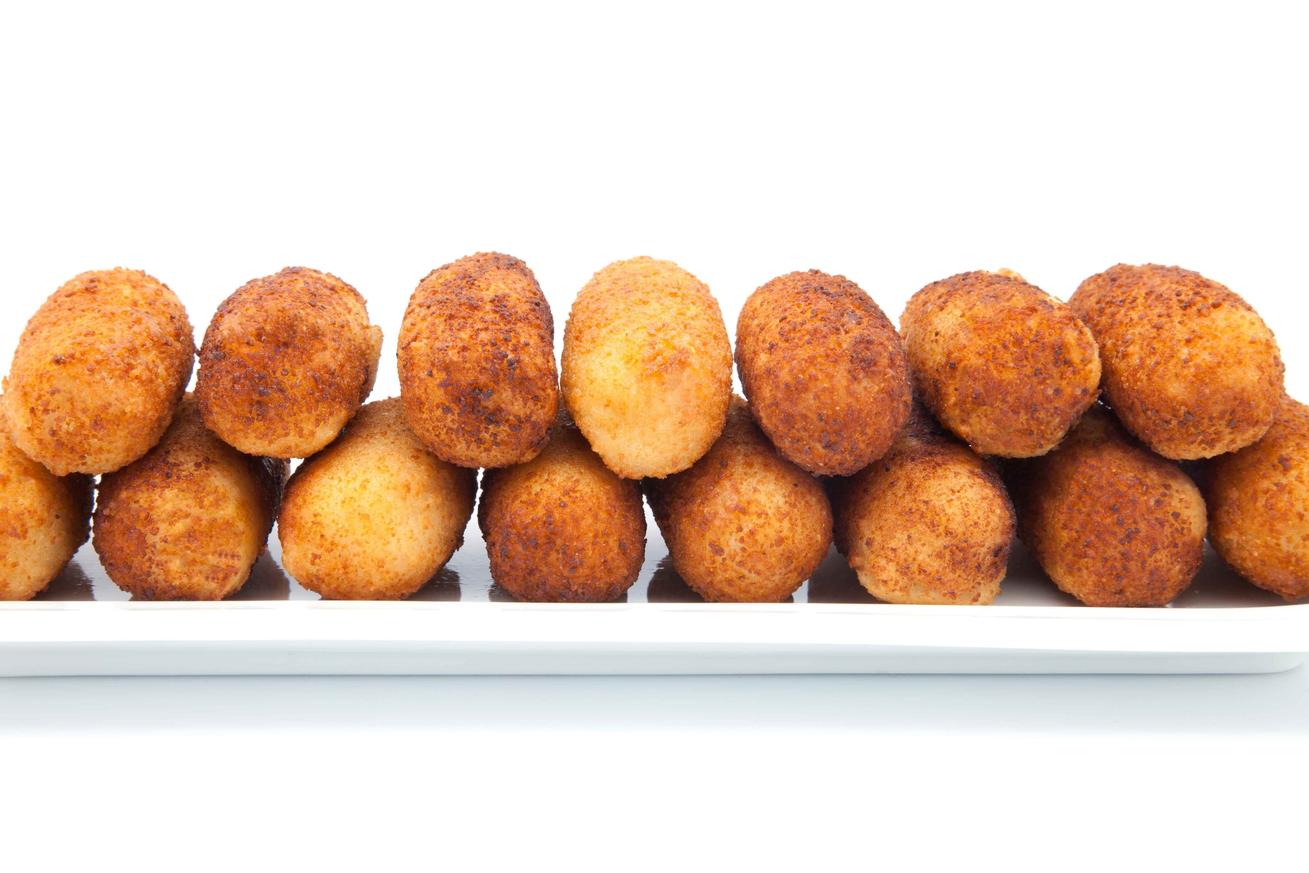 Los amantes de las croquetas son una fuerza tan poderosa que han hecho de su degustación todo un arte. (Shutterstock)